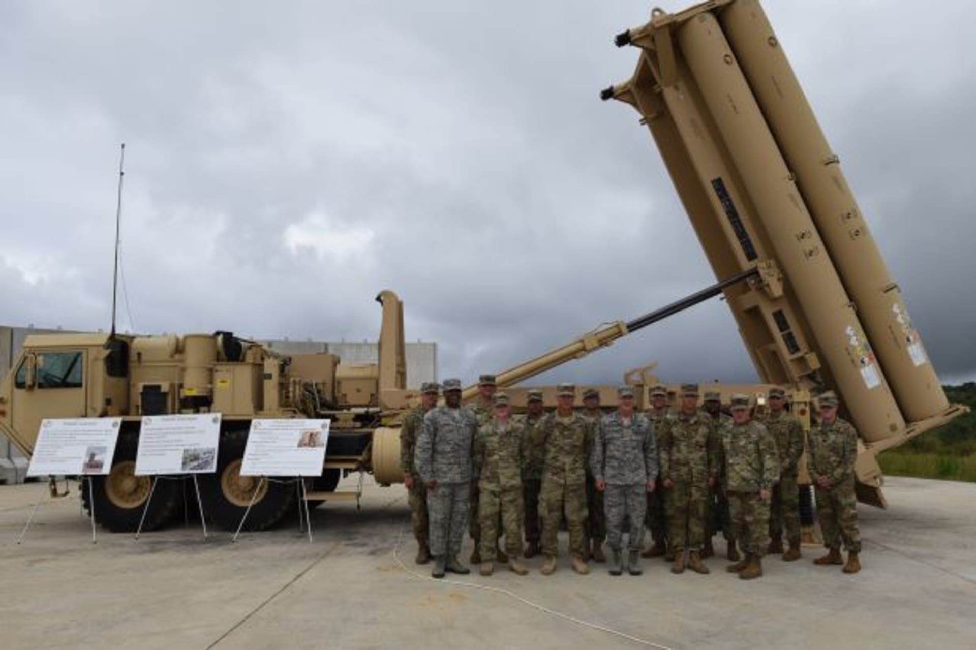 <p>U.S. Air Force Gen. Terrence J. O’Shaughnessy, Pacific Air Forces commander, meets with soldiers in front of a THAAD launcher.</p>
