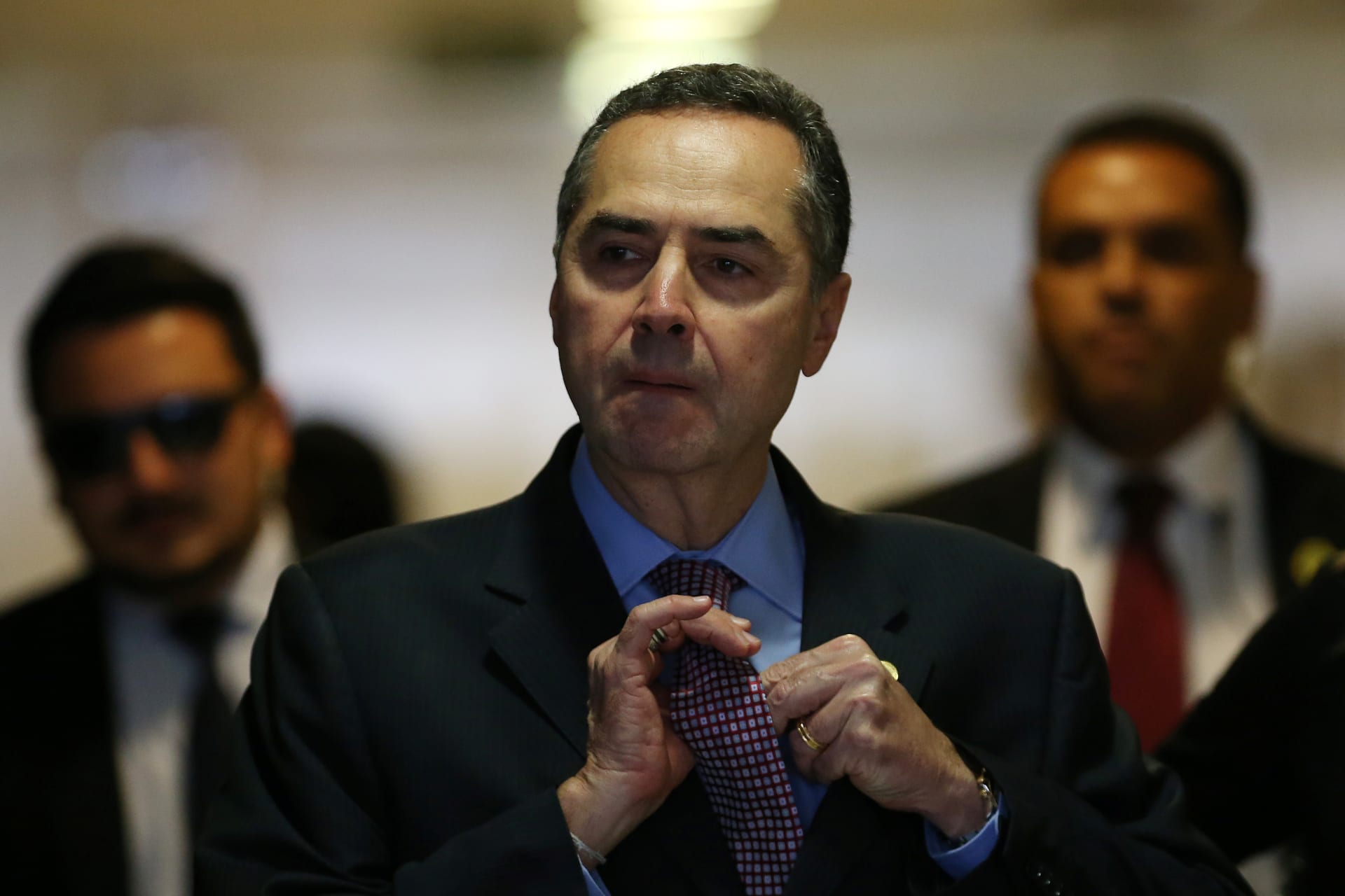 <p>Judge Roberto Barroso gestures inside of the Planalto Palace before a ceremony for inauguration of the new Minister of Culture, Marcelo Calero, in Brasilia, Brazil, May 24, 2016. </p>
