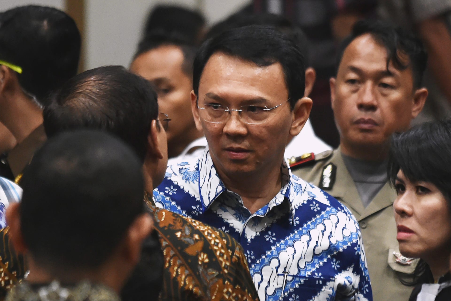 <p>Jakarta’s Christian governor Basuki Tjahaja Purnama, popularly known as Ahok, speaks to his lawyers after the guilty verdict in his blasphemy trial in Jakarta on May 9, 2017. </p>