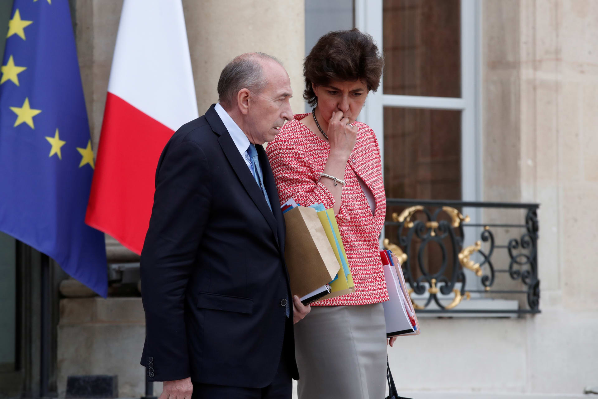<p>French Interior minister Gerard Collomb and the Minister of the Armed Forces Sylvie Goulard leave the Elysee Palace after a weekly cabinet meeting in Paris, France, May 24, 2017.</p>
