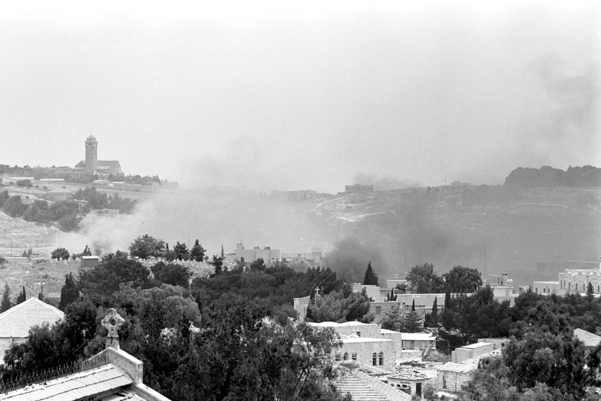 <p>Smoke rises in East Jerusalem during a battle in the 1967 Middle East War, widely known as the Six Day War, in this picture released on June 4, 2007 by Israel’s Defence Ministry (Handout/Reuters).</p>
