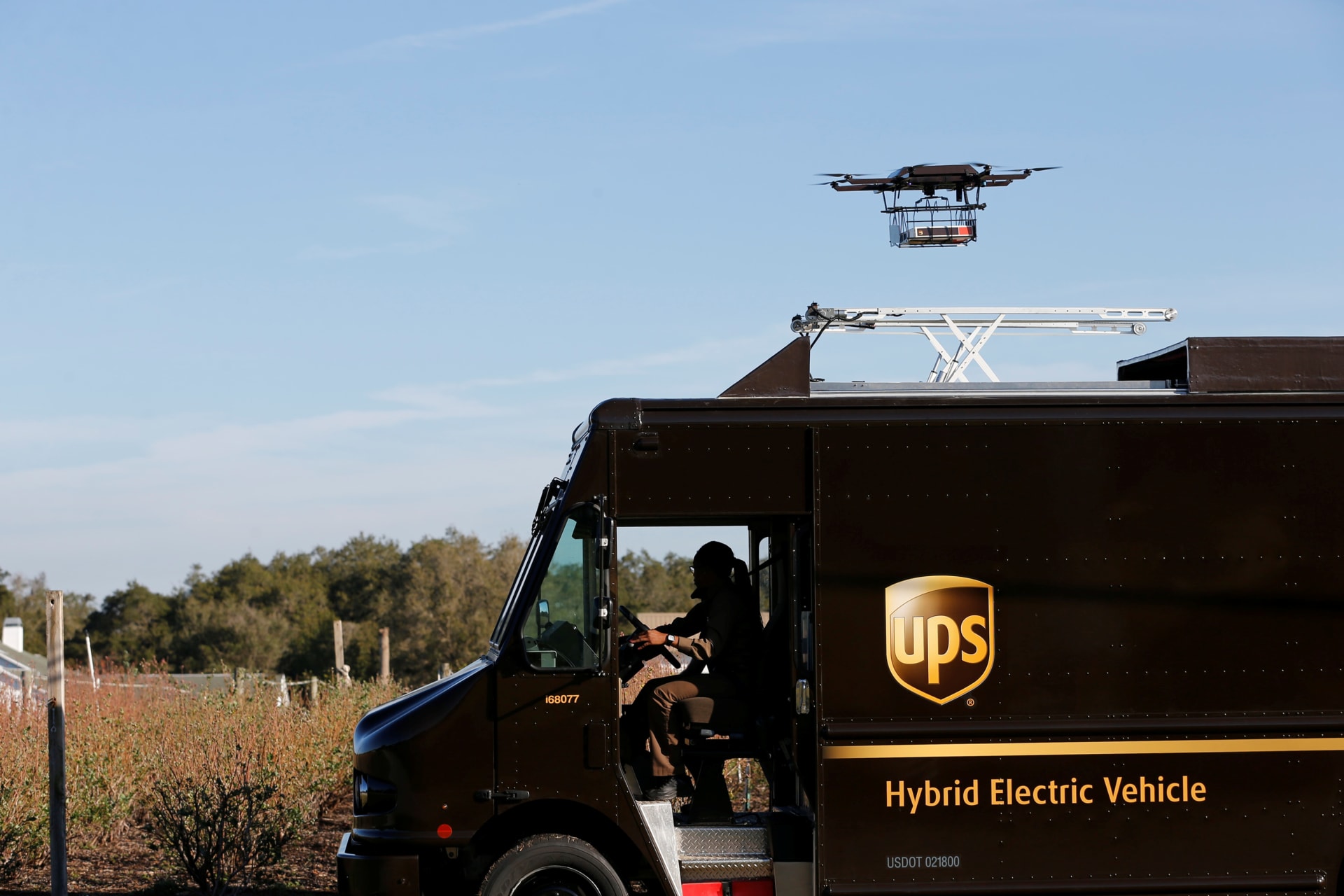 <p>A drone demonstrates delivery capabilities from the top of a UPS truck during testing in Lithia, Florida</p>
