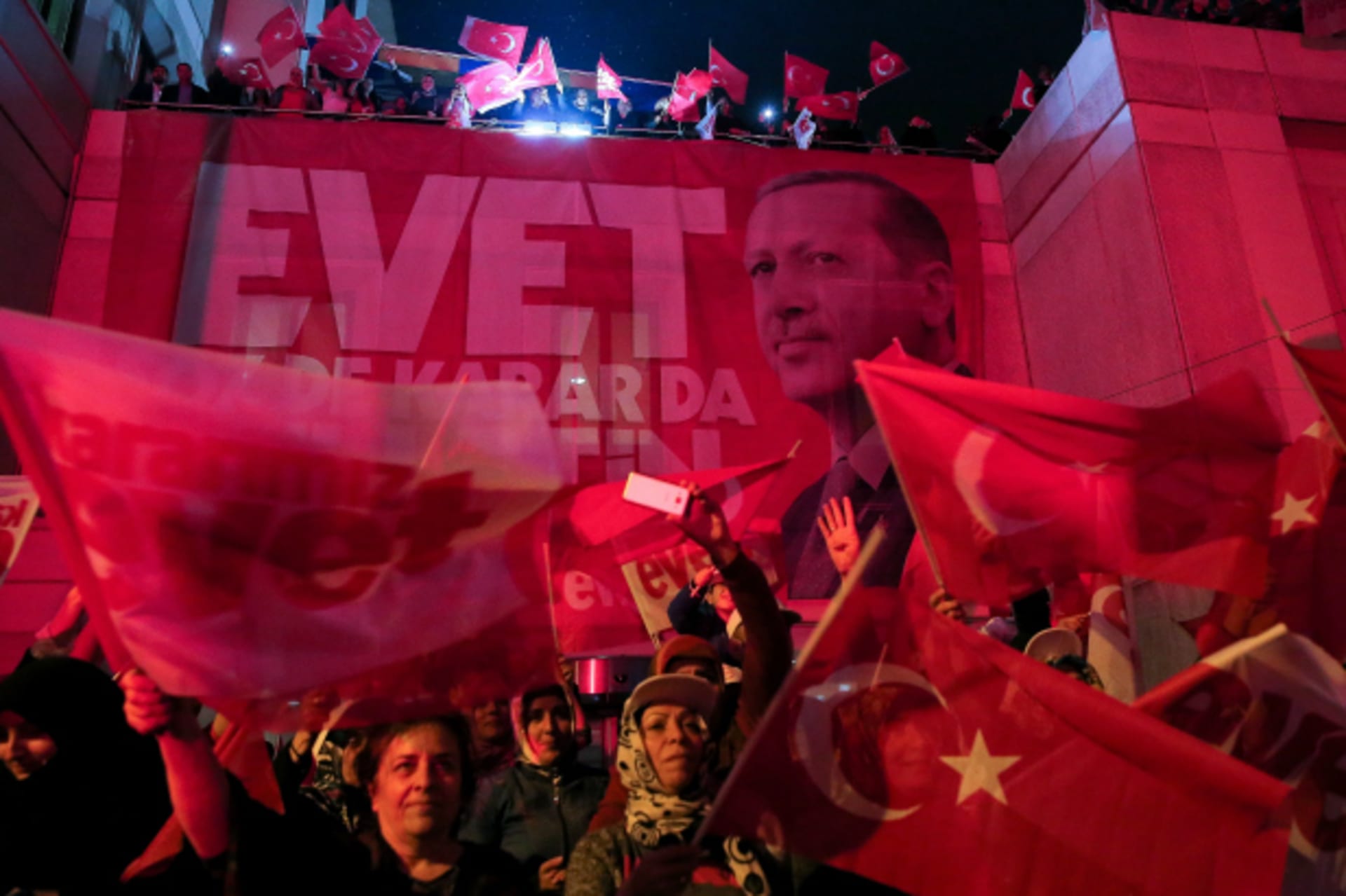 <p>Supporters of Turkish President Tayyip Erdogan celebrate in Istanbul (Huseyin Aldemir/Reuters).</p>
