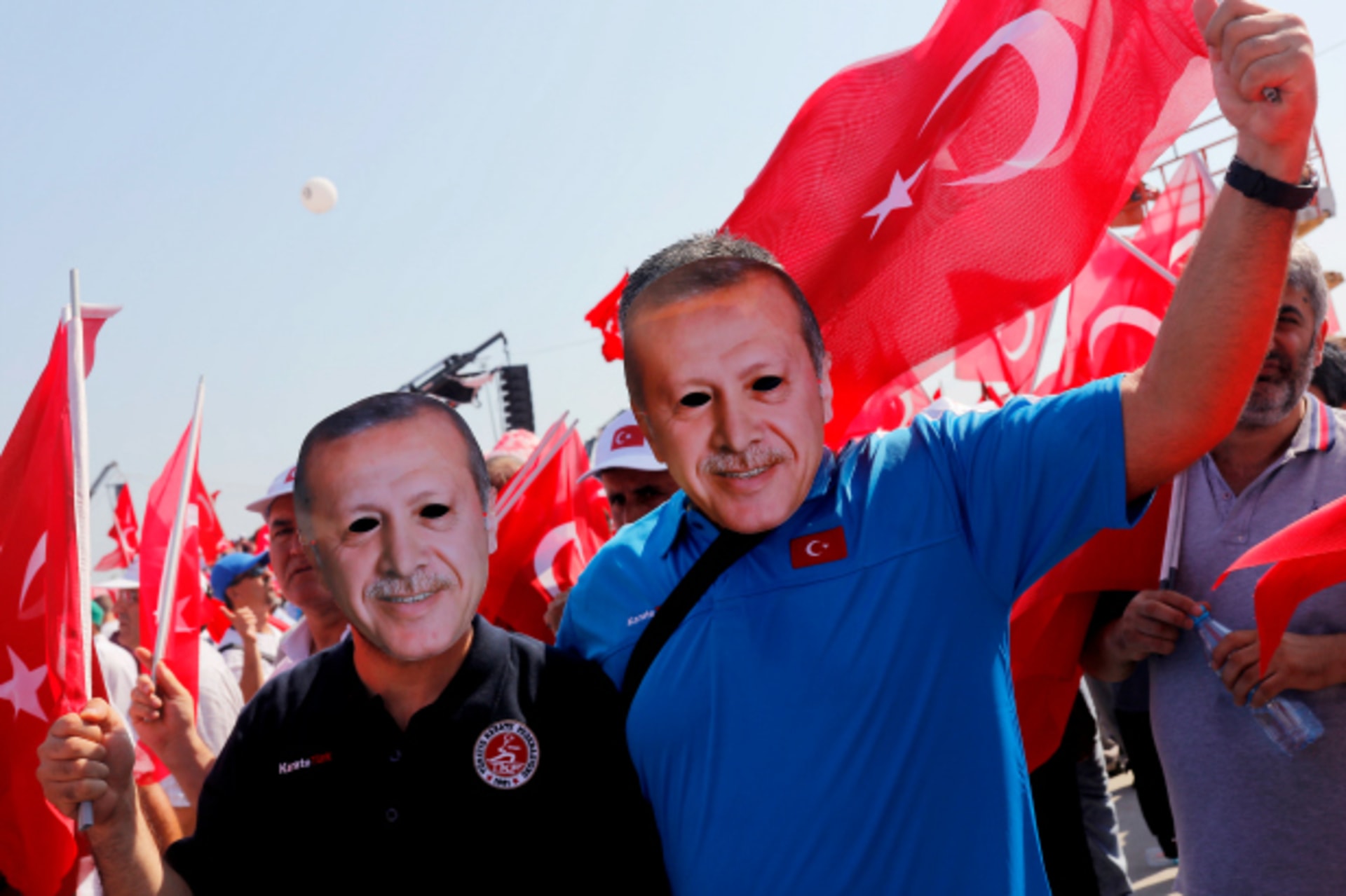 <p>People wear masks depicting Turkish President Tayyip Erdogan during the Democracy and Martyrs Rally (Umit Bektas/Reuters).</p>
