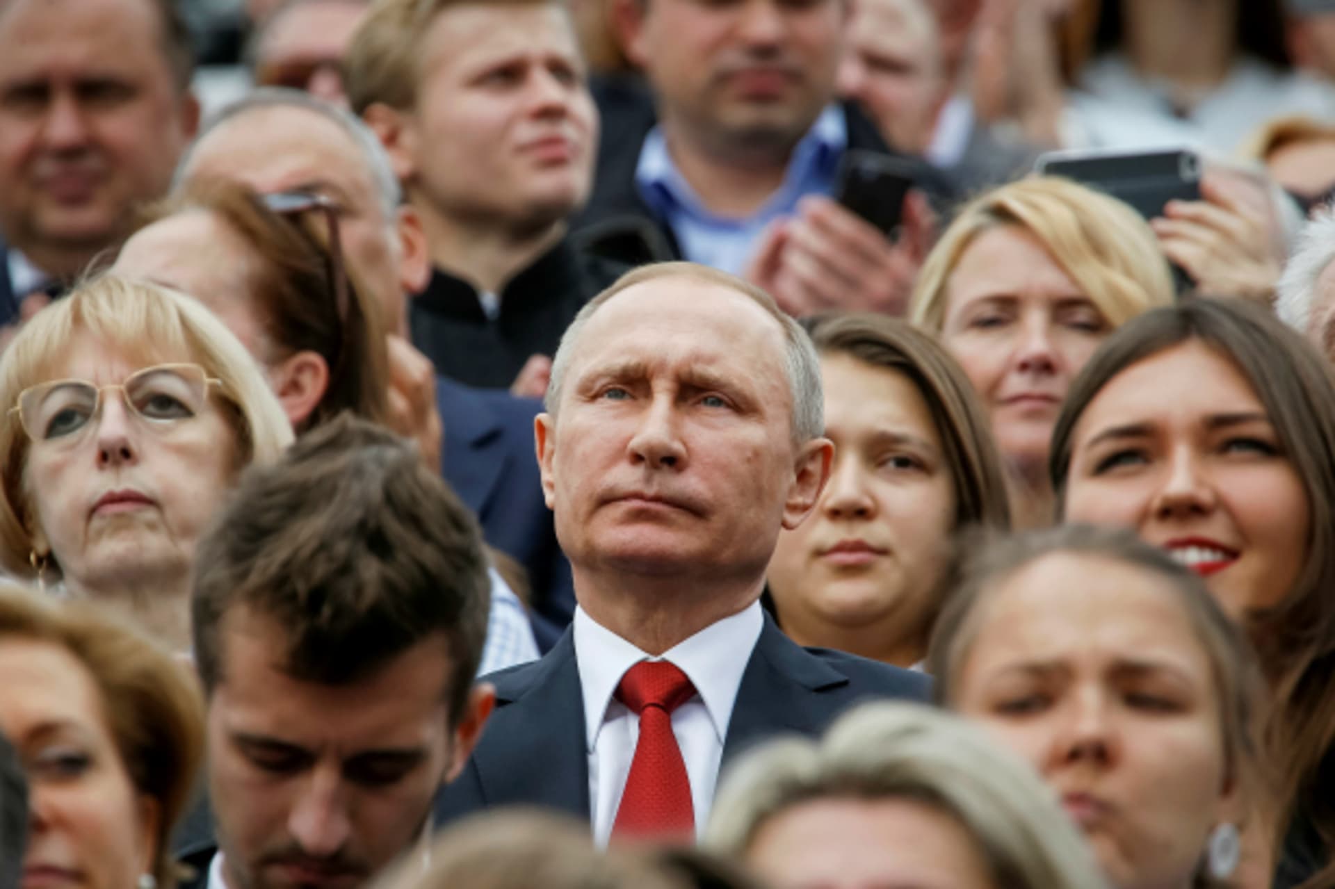 <p>Russian President Vladimir Putin watches the celebrations for the City Day in Moscow, Russia (Sergei Karpukhin/Reuters).</p>
