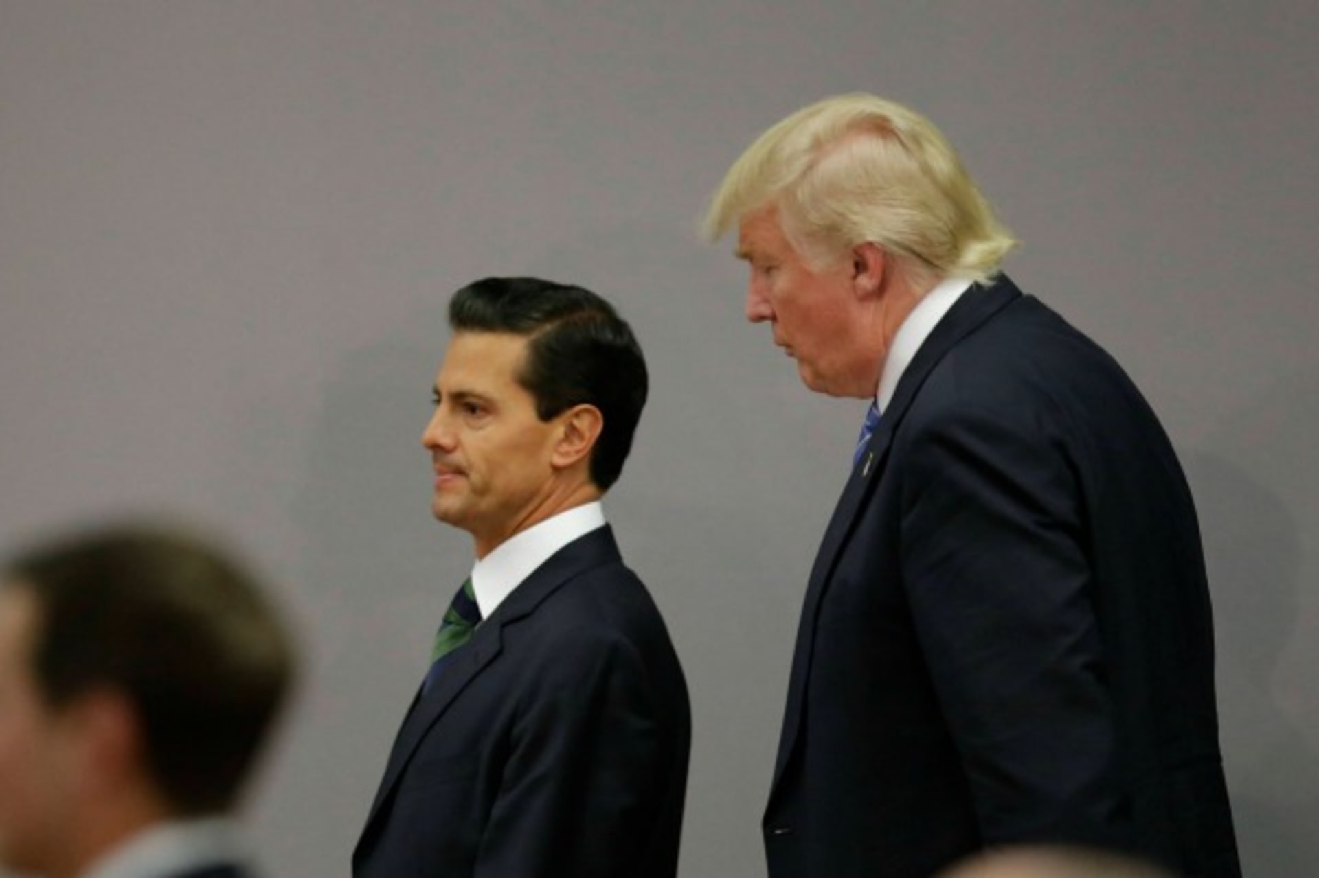 <p>U.S. Republican presidential nominee Donald Trump and Mexico’s President Enrique Pena Nieto walk out after finishing a press conference at the Los Pinos residence in Mexico City, Mexico, August 31, 2016 (Reuters/Henry Romero).</p>
