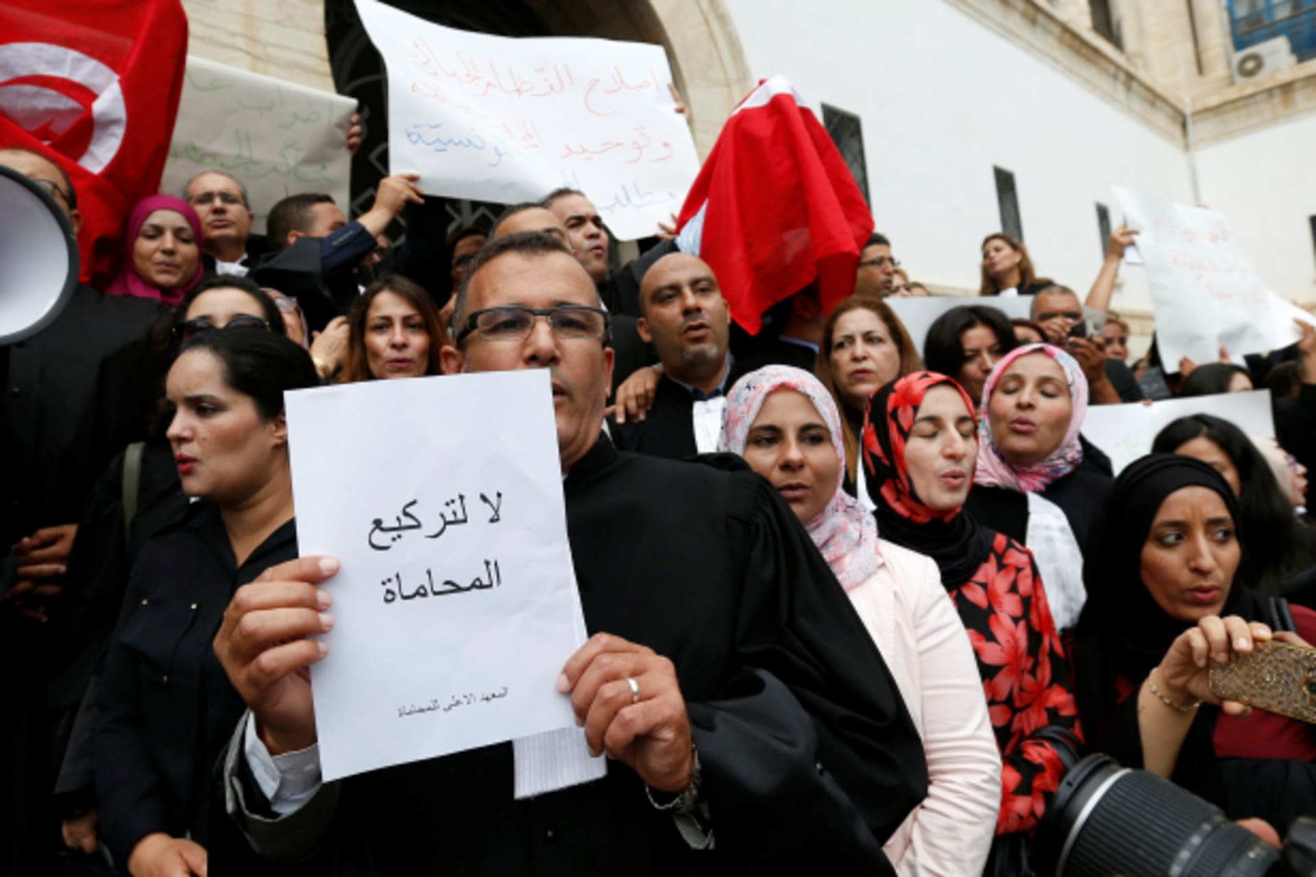 <p>Tunisian lawyers gather as they demonstrate against the government’s proposed new taxes, near the courthouse, in Tunis, Tunisia (Zoubeir Souissi/Reuters).</p>
