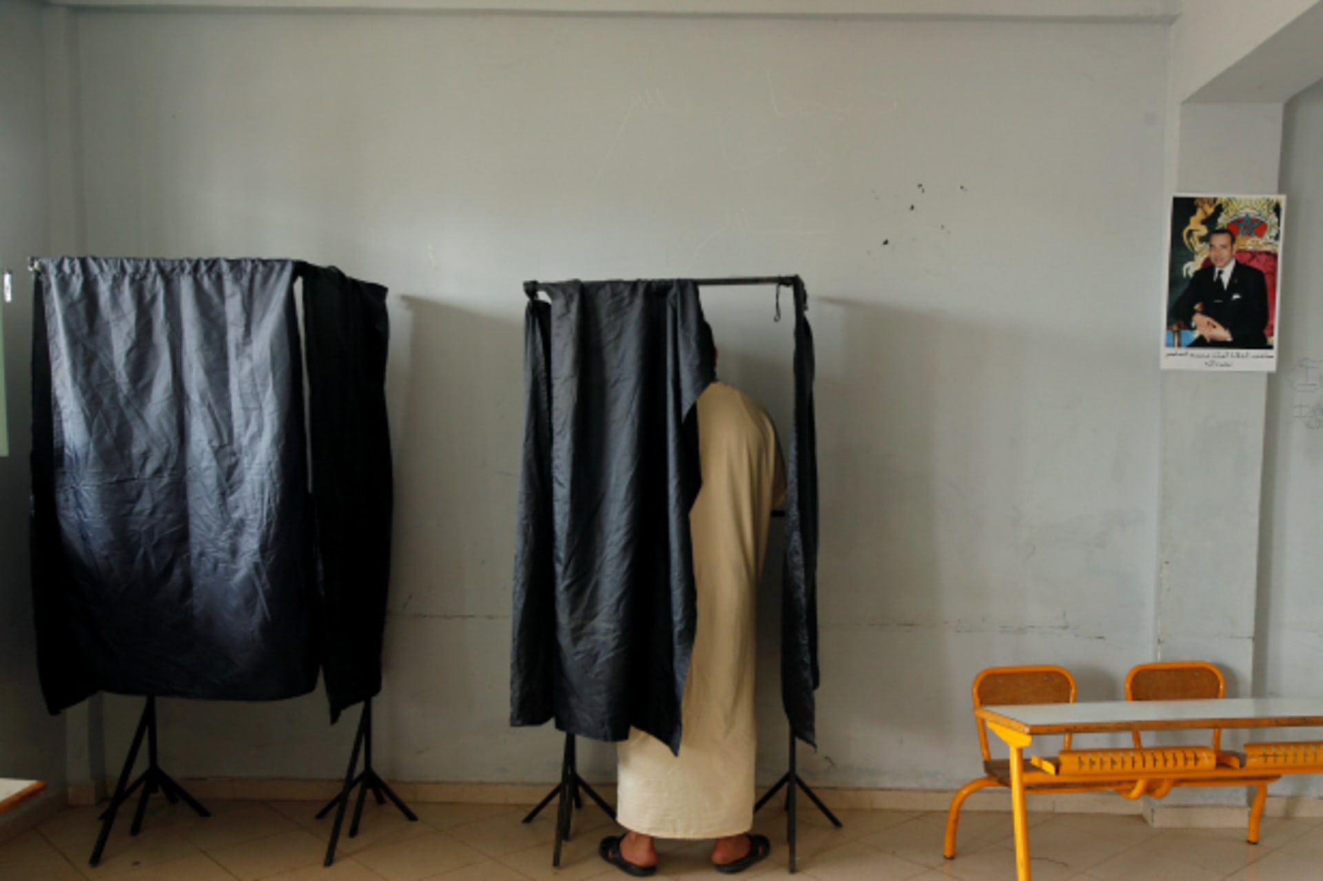 <p>A voter casts his ballot at a polling station in Rabat, Morocco (Youssef Boudlal/Reuters).</p>
