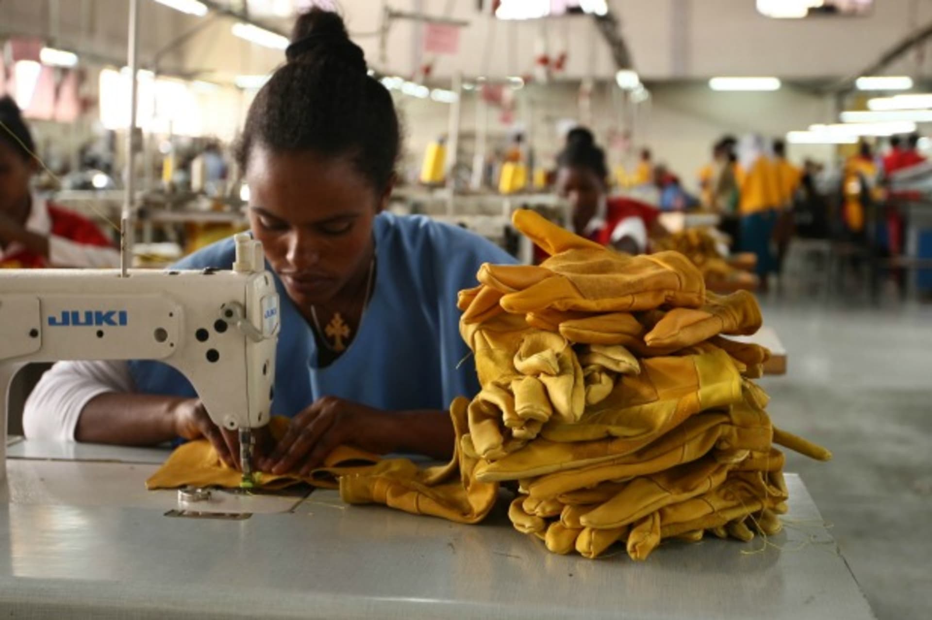 <p>A woman stitches leather gloves at the Pittards world class leather manufacturing company in Ethiopia’s capital Addis Ababa, March 22, 2016. Picture taken March 22, 2016 (Reuters/Tiksa Negeri).</p>

