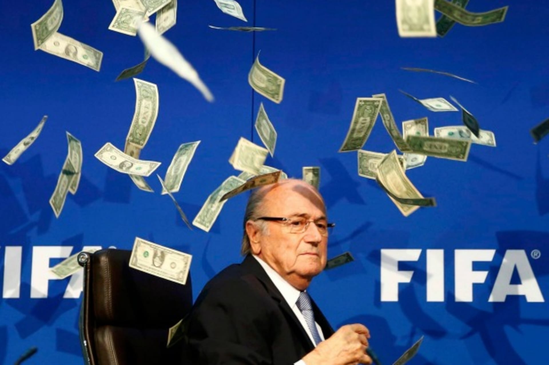 <p>British comedian known as Lee Nelson (unseen) throws banknotes at FIFA President Sepp Blatter as he arrives for a news confere…p Blatter, at a special congress to be held on February 26 in Zurich, the organisation said on Monday (Reuters/Arnd Wiegmann).</p>
