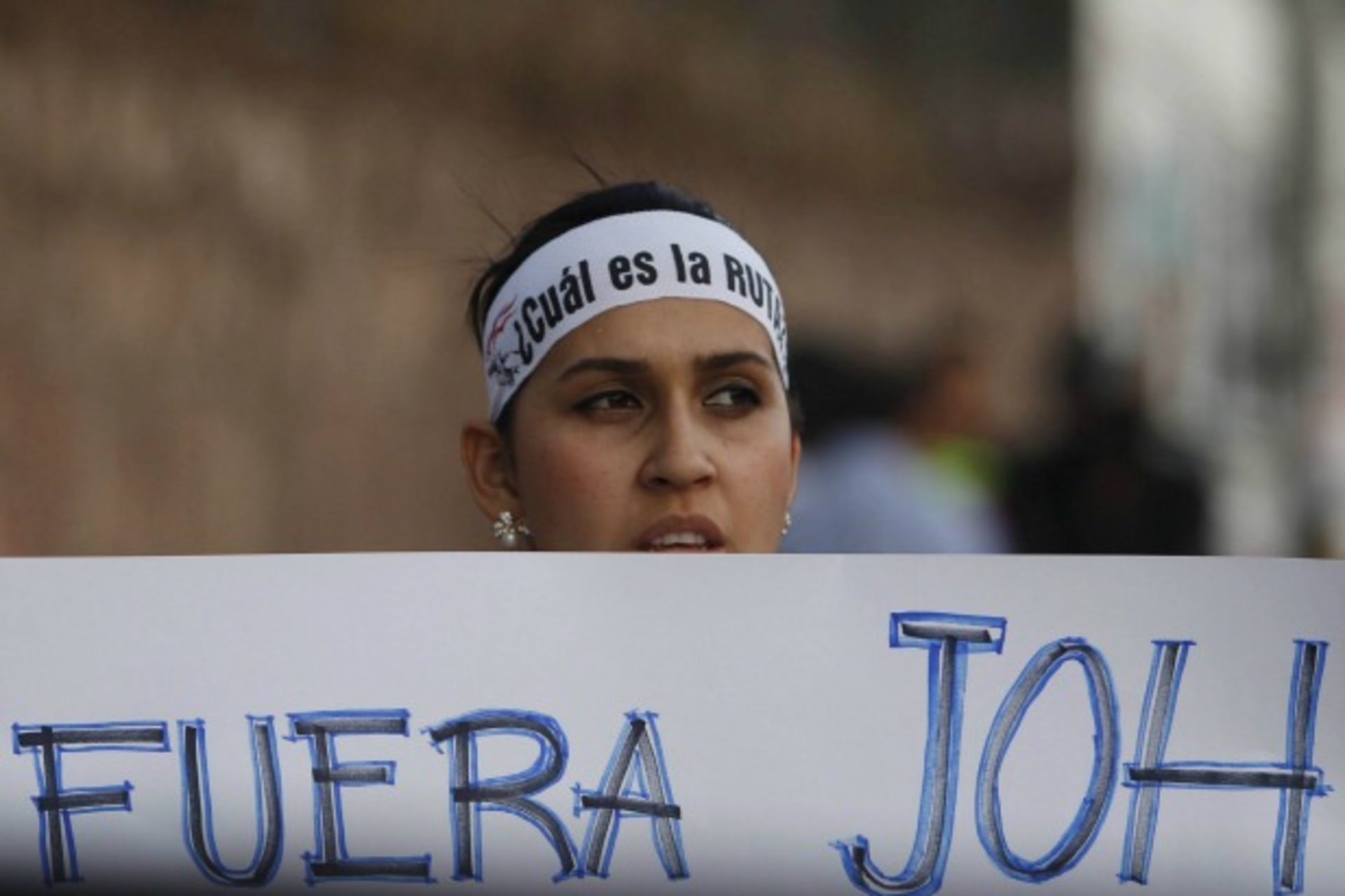 <p>A demonstrator holds a sign that reads “Out JOH”, in a reference to Honduras’ President Juan Orlando Hernandez, during a march…tion of Hernandez over a $200 million corruption scandal at the Honduran Institute of Social Security (Reuters/Jorge Cabrera).</p>
