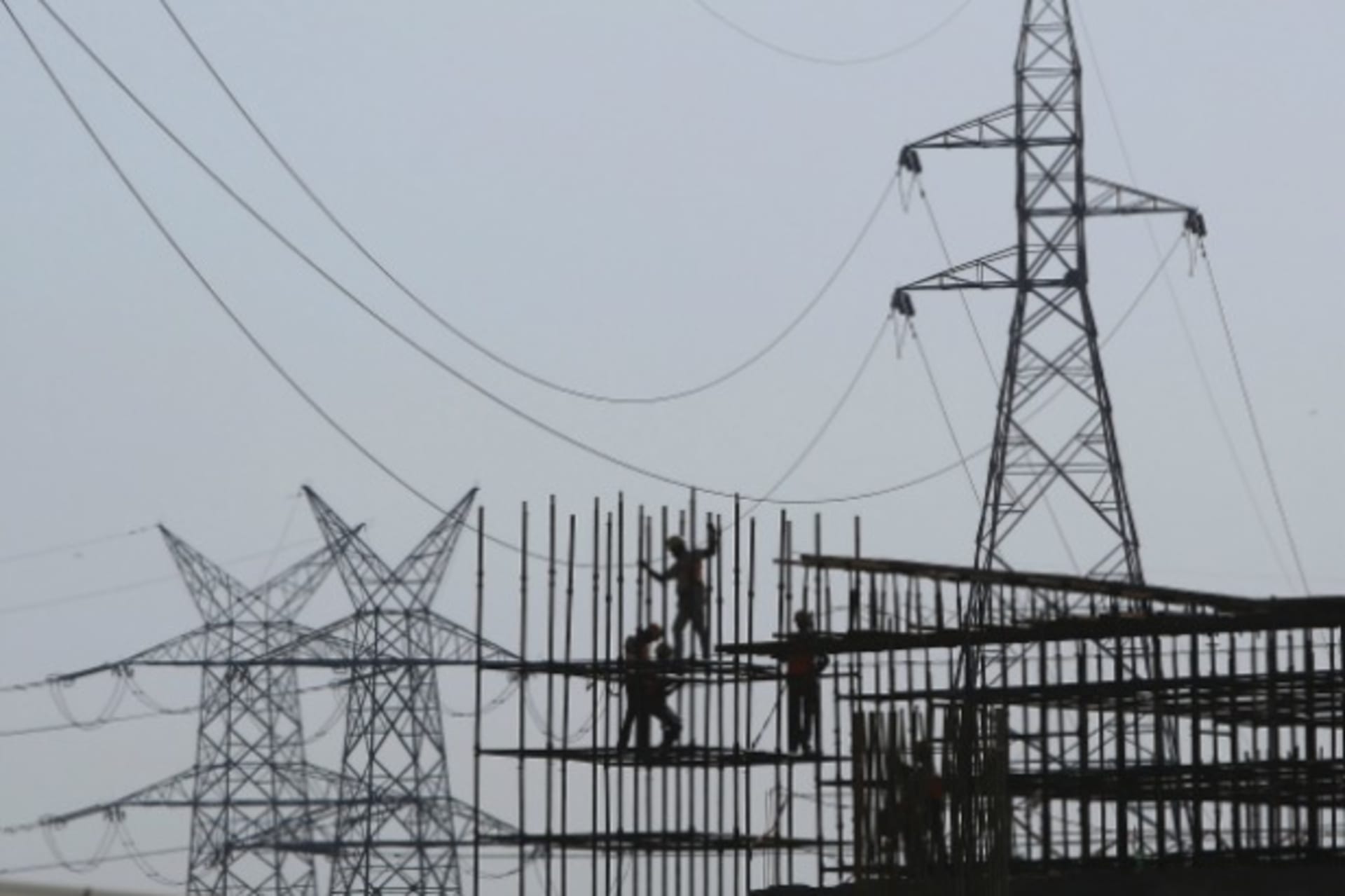 <p>Workers erect scaffolding at the construction site of a metro station in Greater Noida on the outskirts of New Delhi, India, S…, mainly driven by higher cement and electricity generation, government data showed on Wednesday (Reuters/Anindito Mukherjee).</p>
