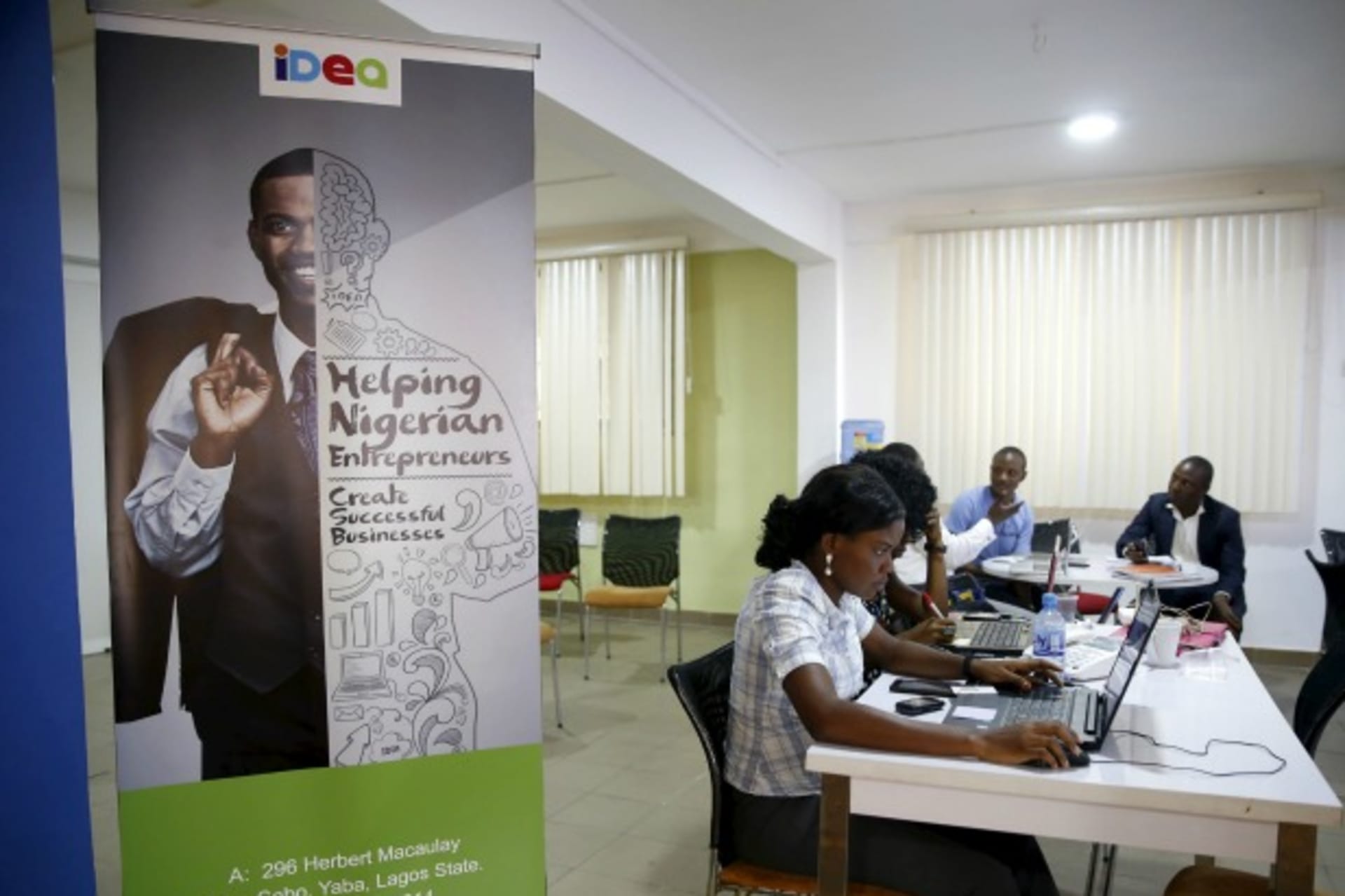 <p>Software developers work on computer sytems at the Information Technology Developers Entrepreneurship Accelerator (iDEA) hub i…t and creating a buzz that is drawing international venture capitalists and more established digital firms. (Reuters/Akinleye)</p>
