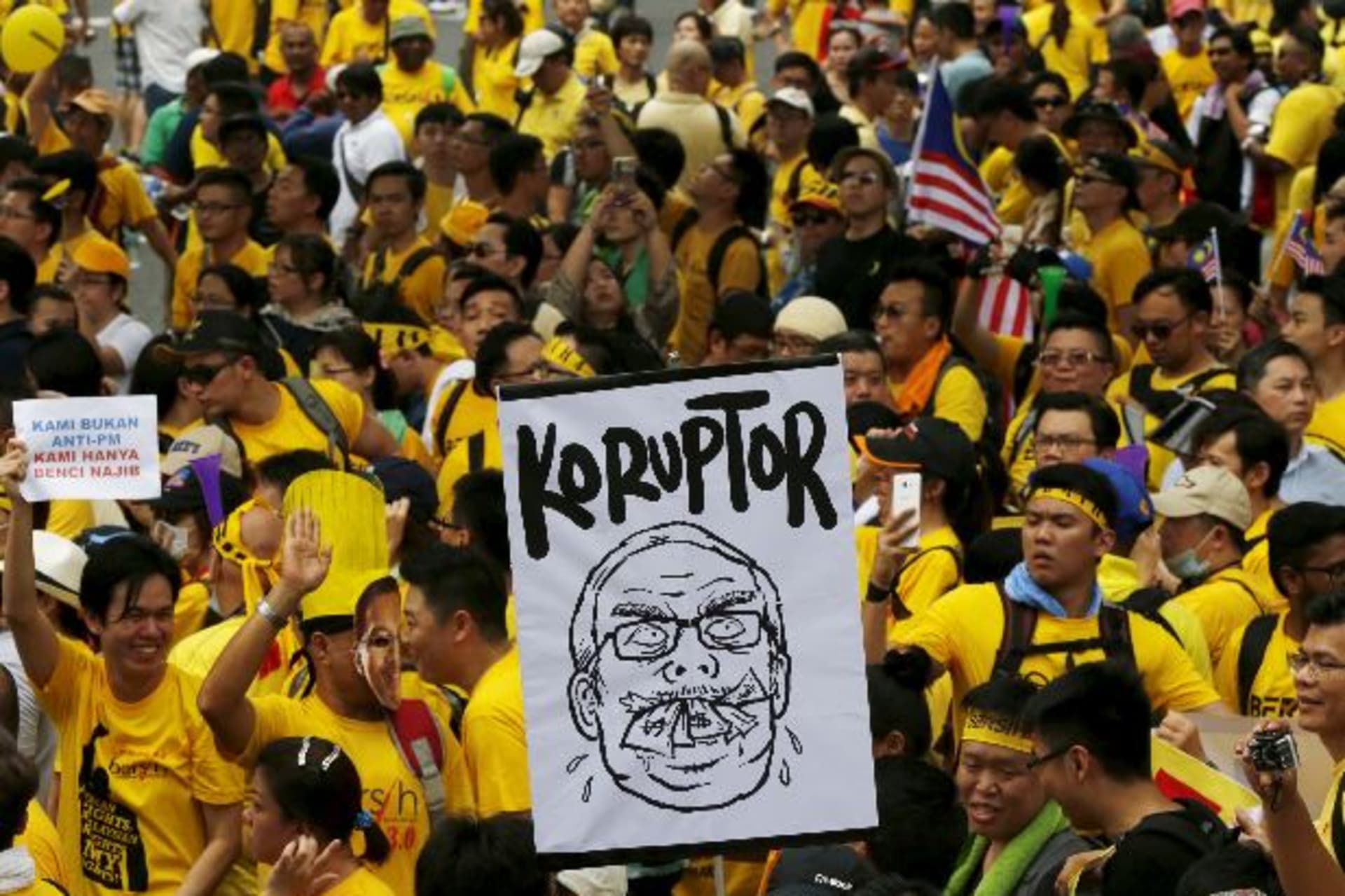<p>Protesters march at a rally organised by pro-democracy group “Bersih” (Clean) in Malaysia’s capital city of Kuala Lumpur, Augu… his name. The placards read, “Corruptor” and “We are not against prime minister, we just hate Najib” (Olivia Harris/Reuters).</p>
