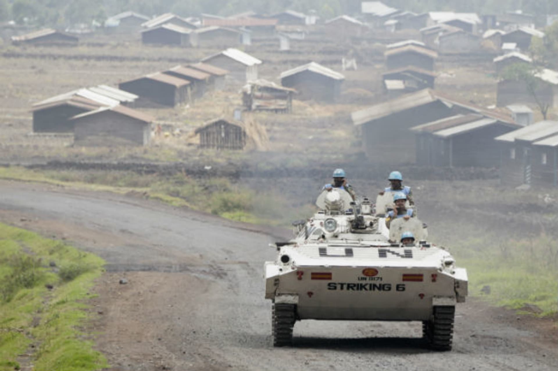 <p>UN peacekeepers patrol near a village in eastern Democratic Republic of the Congo on August 7, 2013.</p>