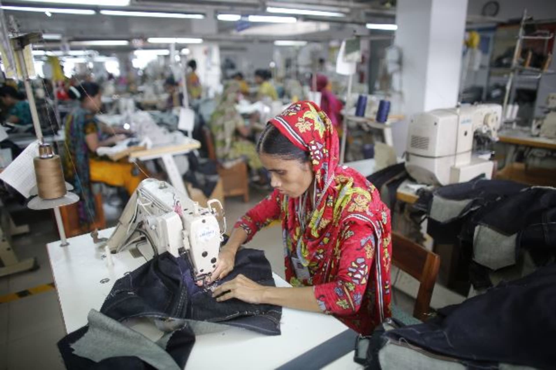 <p>A worker works in a factory of Ananta Garments Ltd in Savar June 10, 2014. Picture taken June 10, 2014. To match Insight Bangladesh-Textiles (Reuters/Andrew Biraj)</p>
