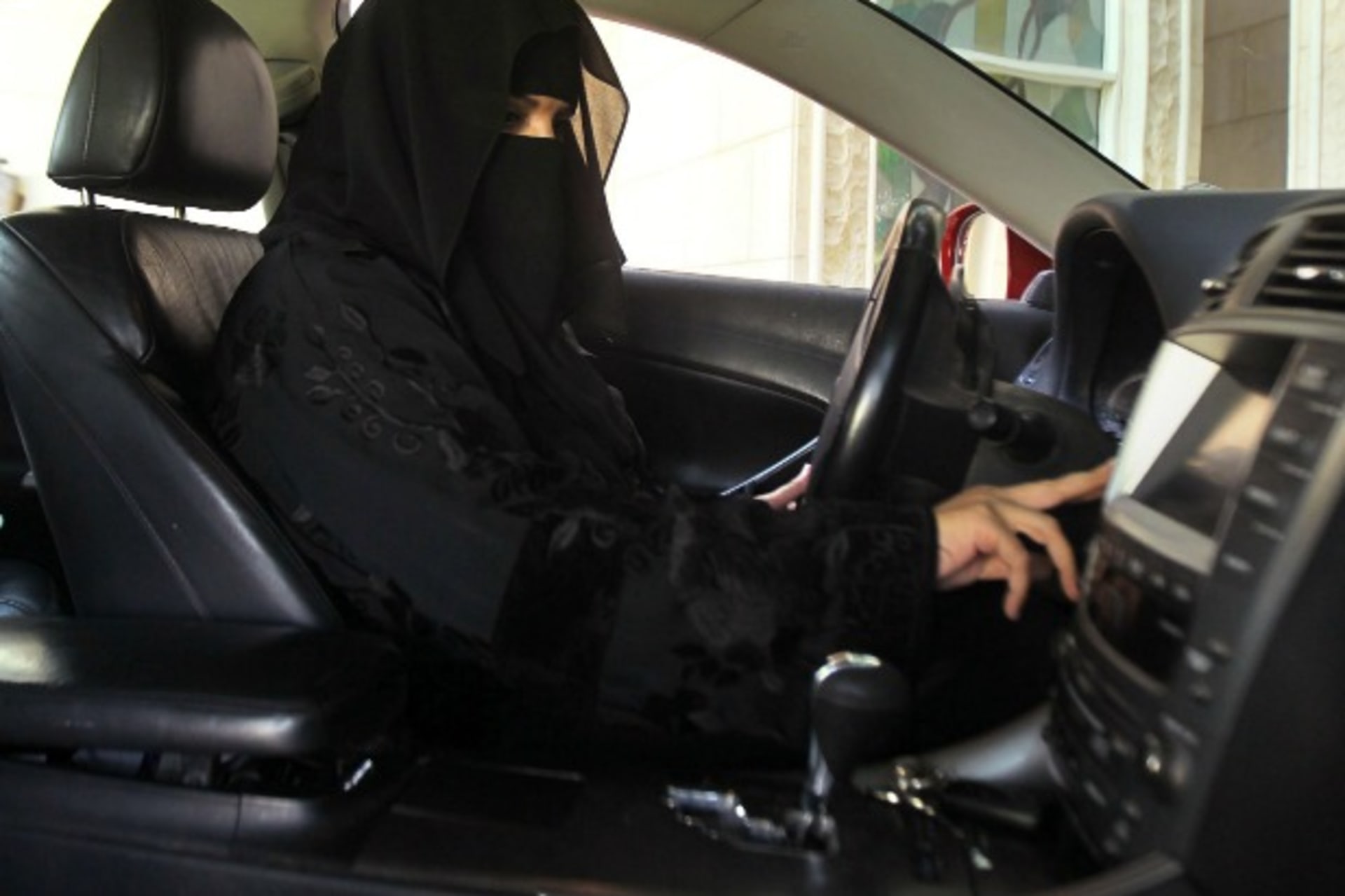 <p>A woman drives a car in October 2013 in Saudi Arabia, the only country in the world where women are barred from driving. Saudi female activists are campaigning to change this rule (Courtesy Reuters/Faisal Al Nasser).</p>
