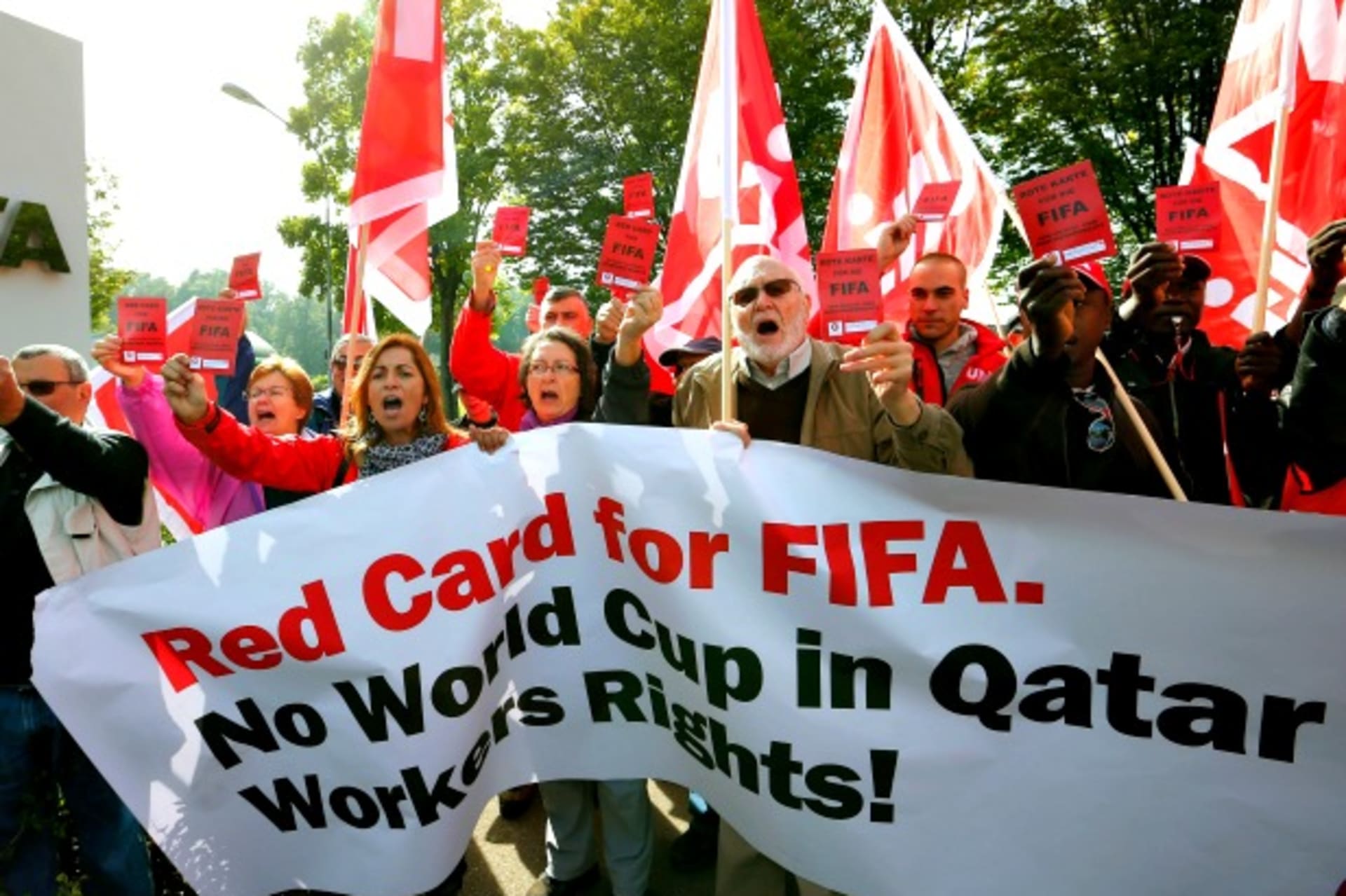 <p>Members of the Swiss UNIA workers union protest the Qatar 2022 World Cup in front of the headquarters of soccer’s international governing body FIFA in Zurich, Switzerland, October 2013 (Courtesy Reuters/Arnd Wiegmann).</p>
