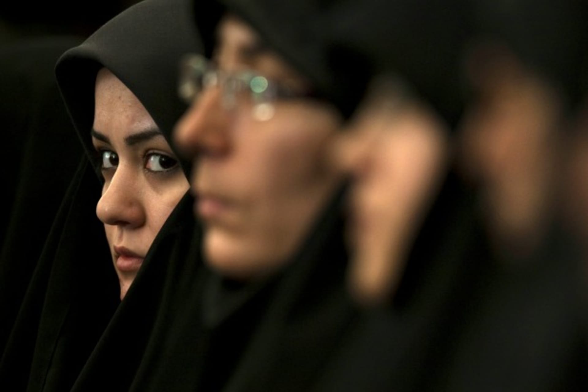 <p>A religious activist looks on while attending the Twenty-Fifth International Islamic Unity Conference in Tehran, Iran, February 2012 (Courtesy Reuters/Morteza Nikoubazl).</p>
