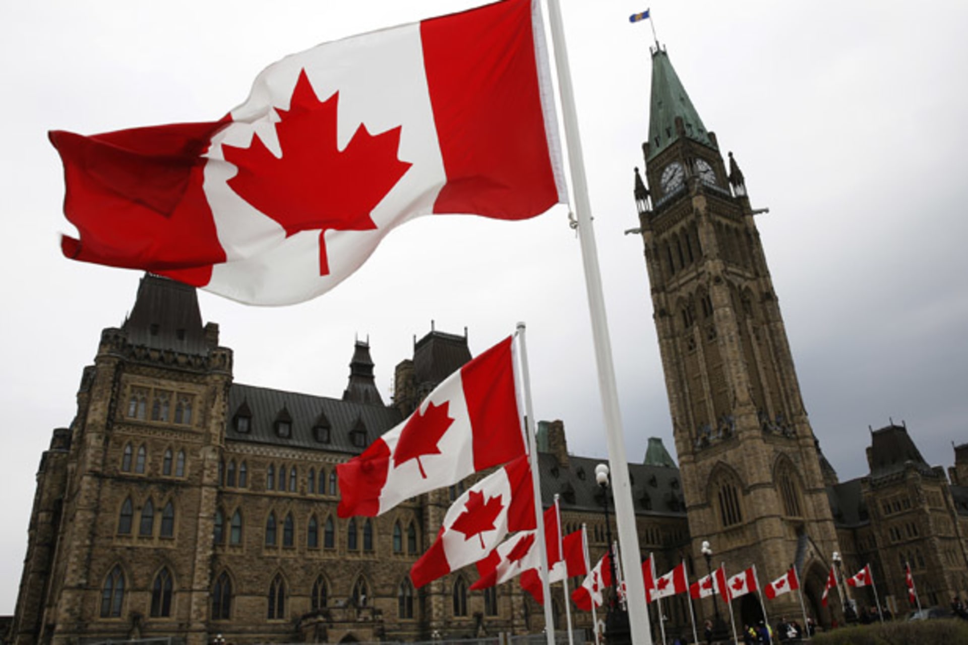 <p>Canada flags Parliament Hill Ottawa</p>
