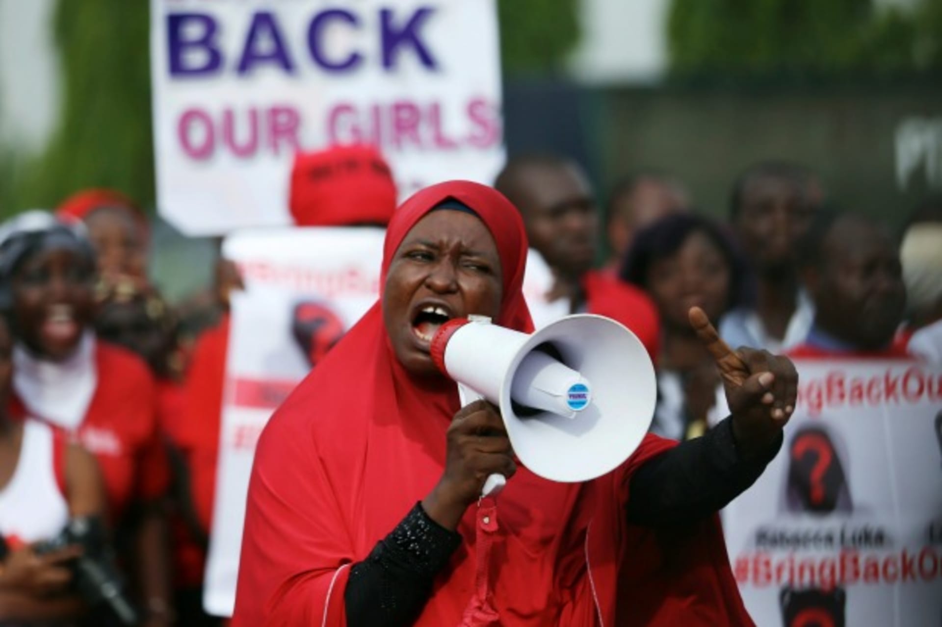 <p>A protester addresses the “Bring Back Our Girls” protest group as they march to the presidential villa to deliver a protest le…hoolgirls in Chibok who were kidnapped by Islamist militant group Boko Haram, May 22, 2014 (Courtesy Reuters/Afolabi Sotunde).</p>
