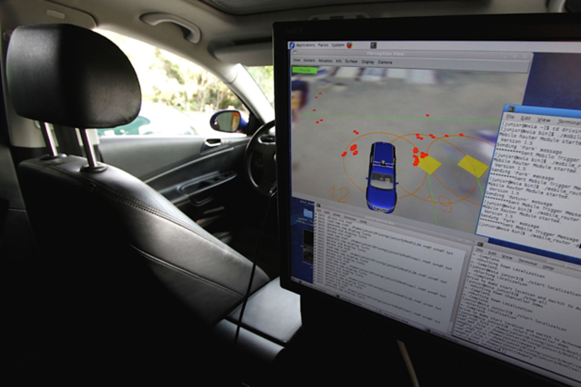 A monitor in the back seat displays sensor readings and other information in a driverless car at the Volkswagen Automotive Innovation Laboratory at Stanford University (Kevin Bartram/Courtesy Reuters).