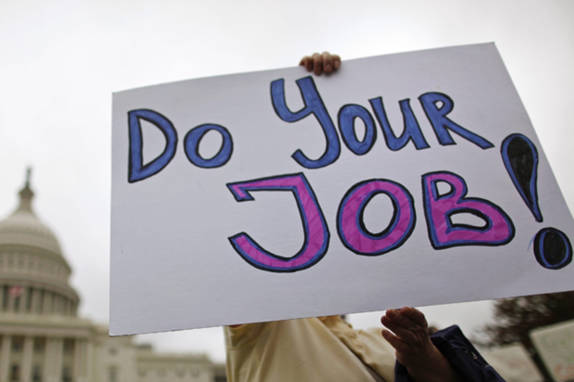 Federal workers demonstrate for an end to the U.S. government shutdown on the west front of the U.S. Capitol in Washington, October 13, 2013 (Jonathan Ernst/Courtesy Reuters).