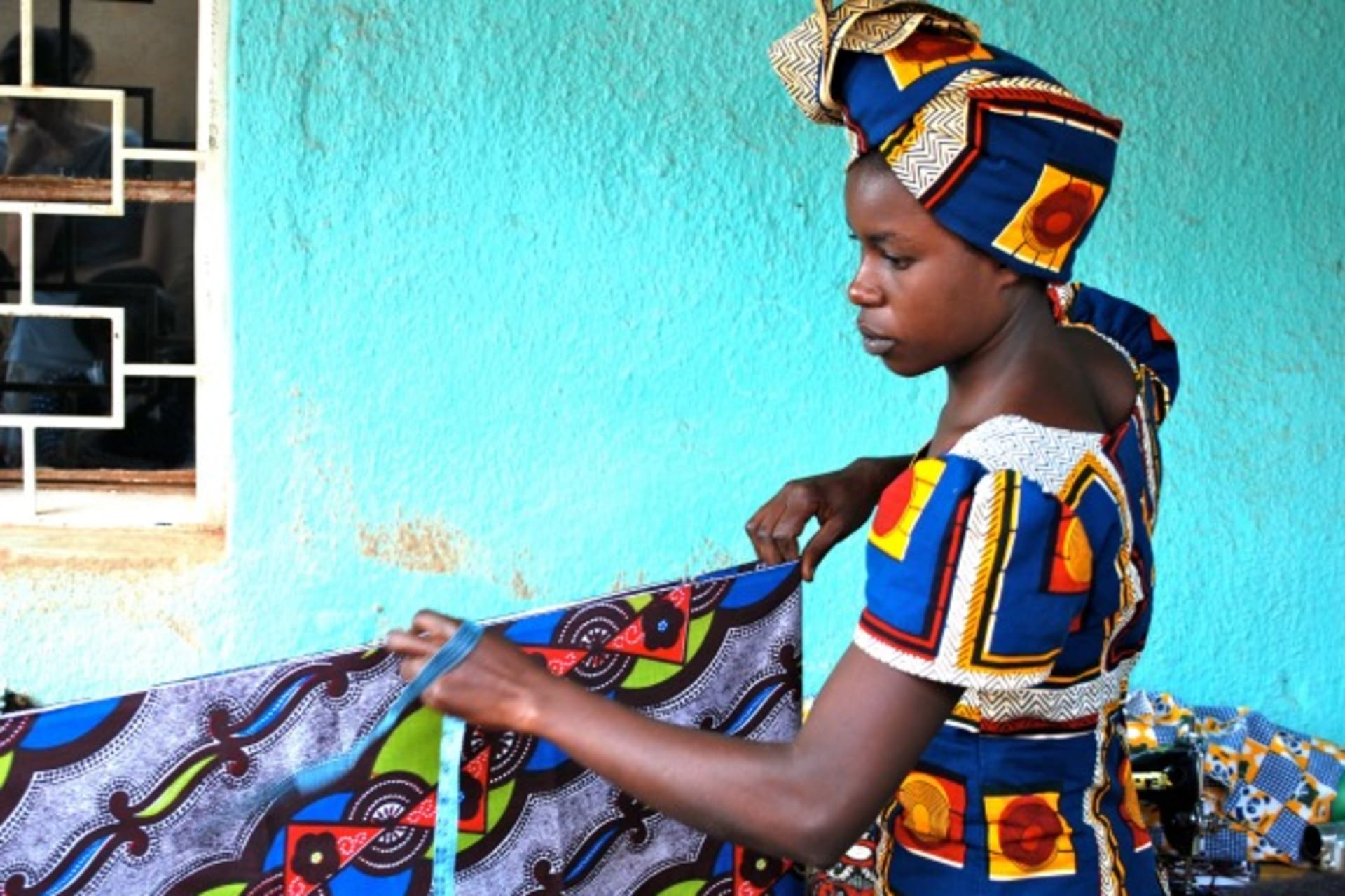 <p>Artisan entrepreneur Therese Iribagiza at Indego Africa’s partner cooperative, Cocoki, in Kigali, Rwanda, 2011 (Courtesy Benjamin D. Stone, copyright Indego Africa).</p>