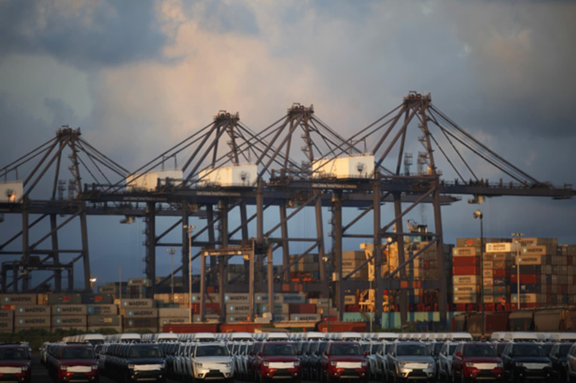 Cars and containers are seen in the port of Lazaro Cardenas