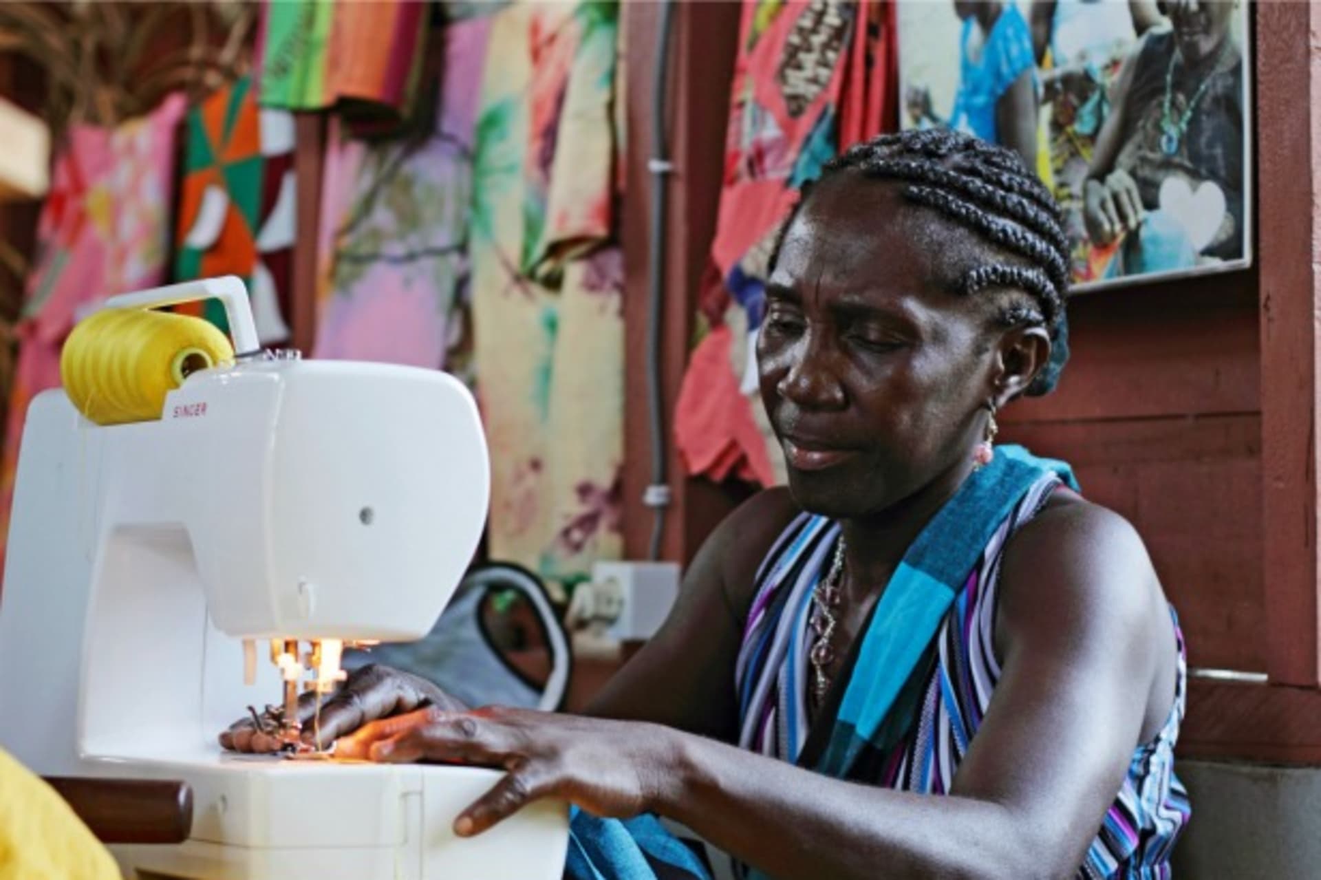 <p>A woman at work in Nieuw Aurora, Suriname, September 2012 (Courtesy Reuters/Ranu Abhelakh).</p>
