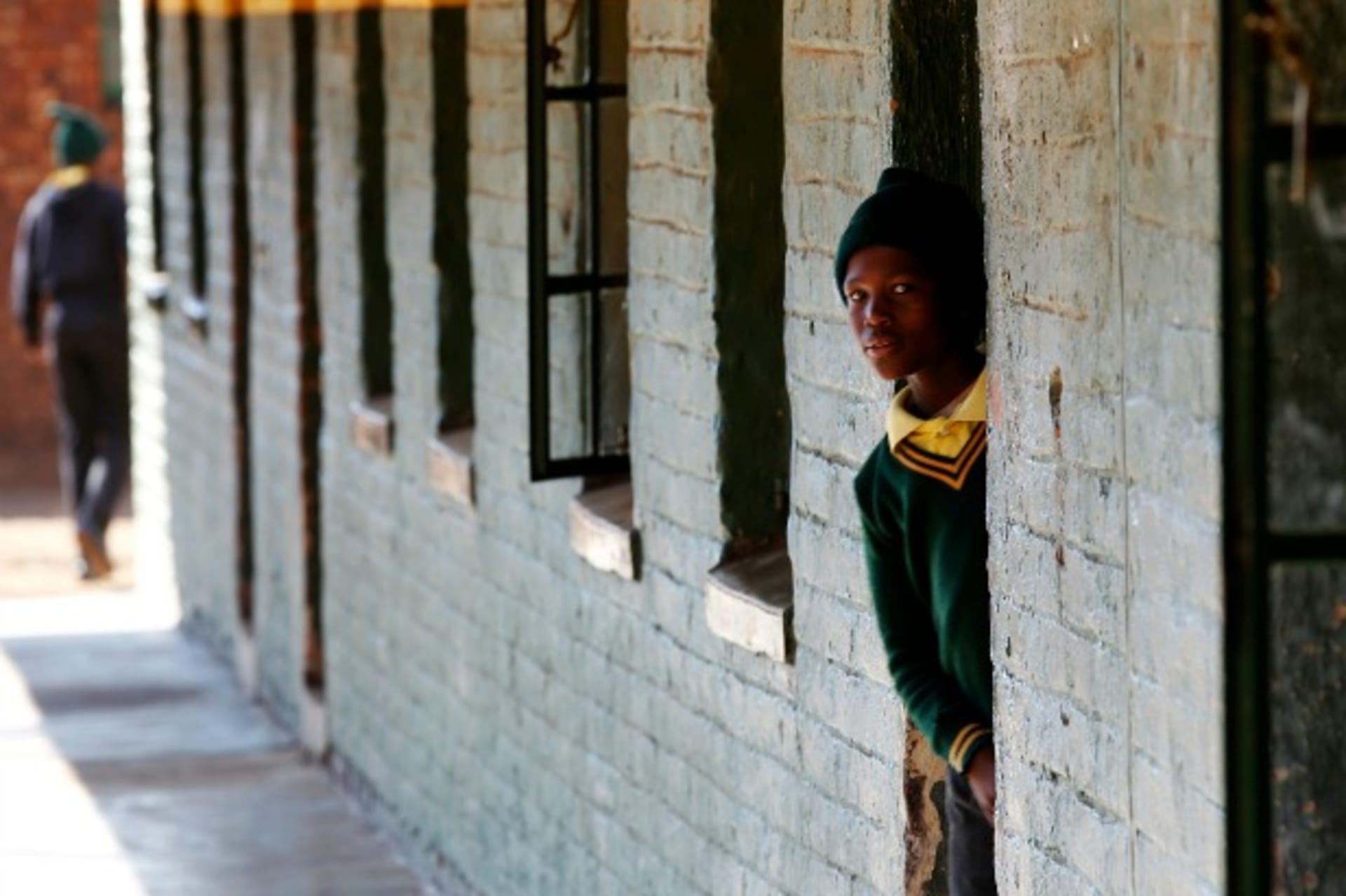 <p>A student at school in Khutsong Township, South Africa, August 2011 (Courtesy Reuters/Siphiwe Sibeko).</p>
