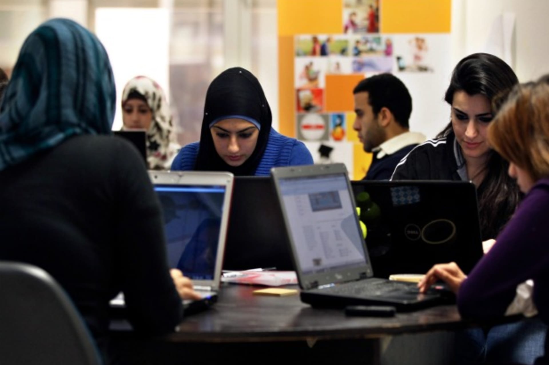 <p>Young entrepreneurs at Oasis 500, a seed investment firm based in Amman, Jordan that finances start-ups in the Middle East, November 2011. (Courtesy Reuters/Muhammad Hamed).</p>
