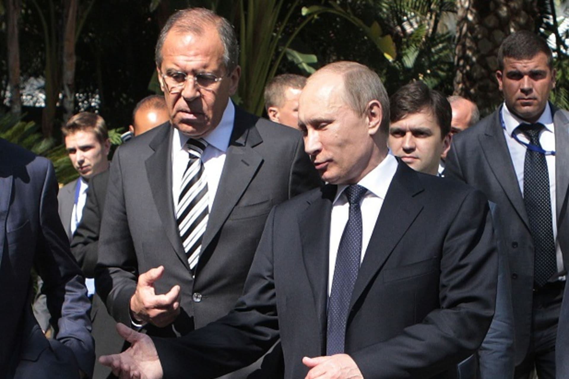 Russia's President Putin leaves a BRICS meeting next to Foreign Minister Lavrov in Los Cabos