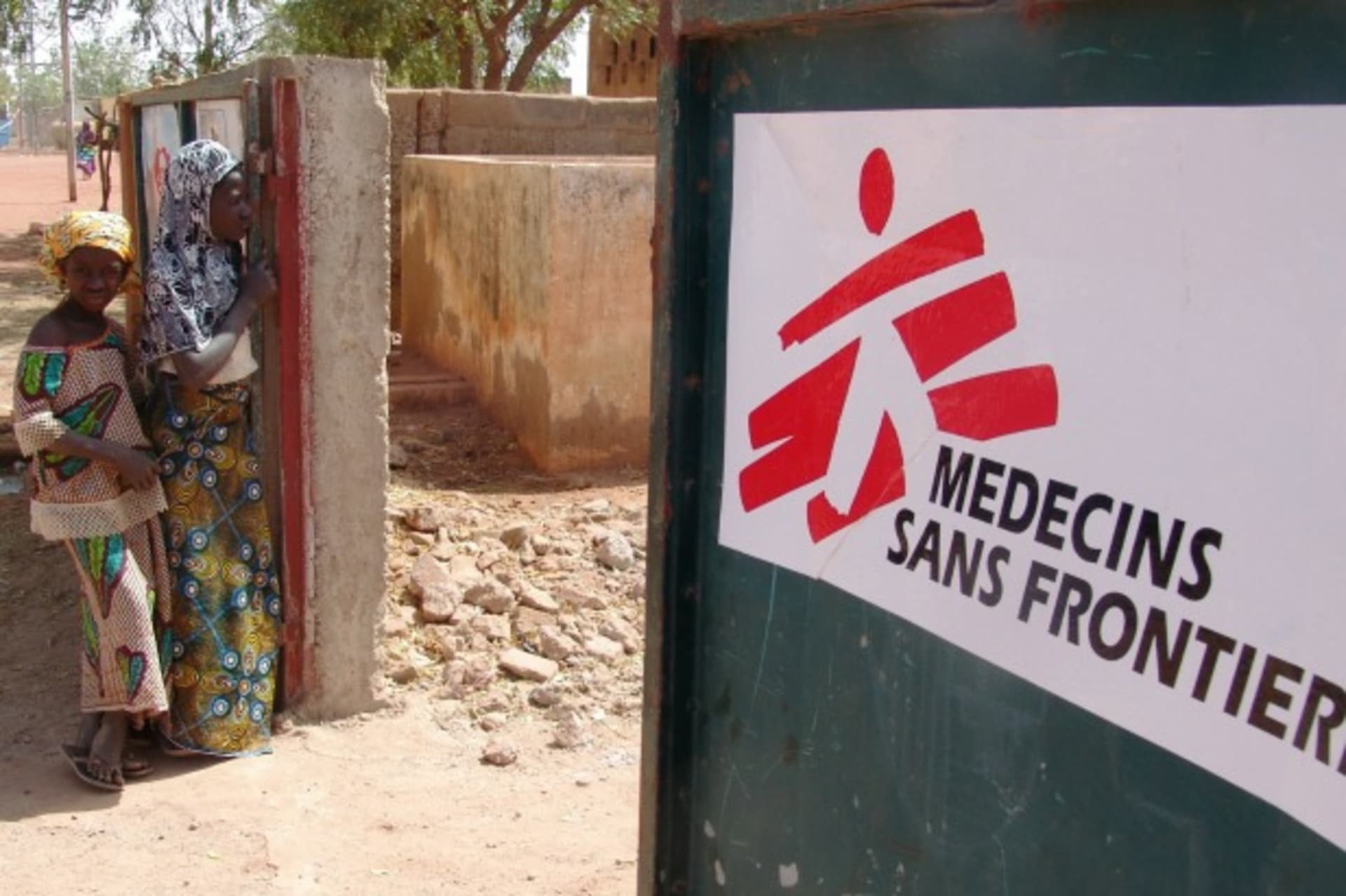 <p>Residents stand outside a medical center run by Doctors Without Borders (Médecins Sans Frontières) in central Mali, February 2013 (Courtesy Reuters/Alain Amontchi).</p>
