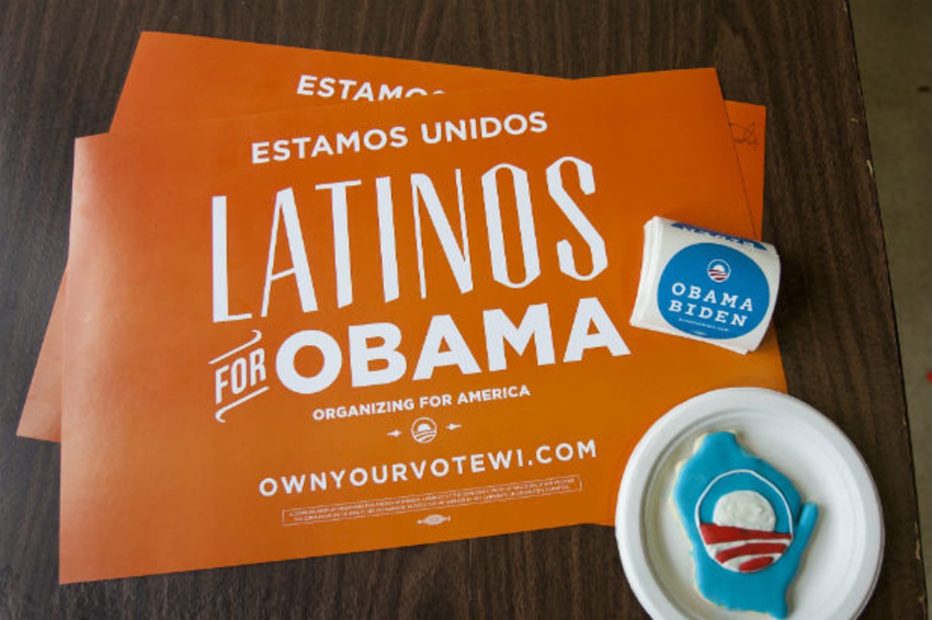 <p>Placards and campaign stickers sit on a table at the Latino regional headquarters for the Obama campaign during election day of the U.S. presidential election in Milwaukee, Wisconsin November 6, 2012.</p>
