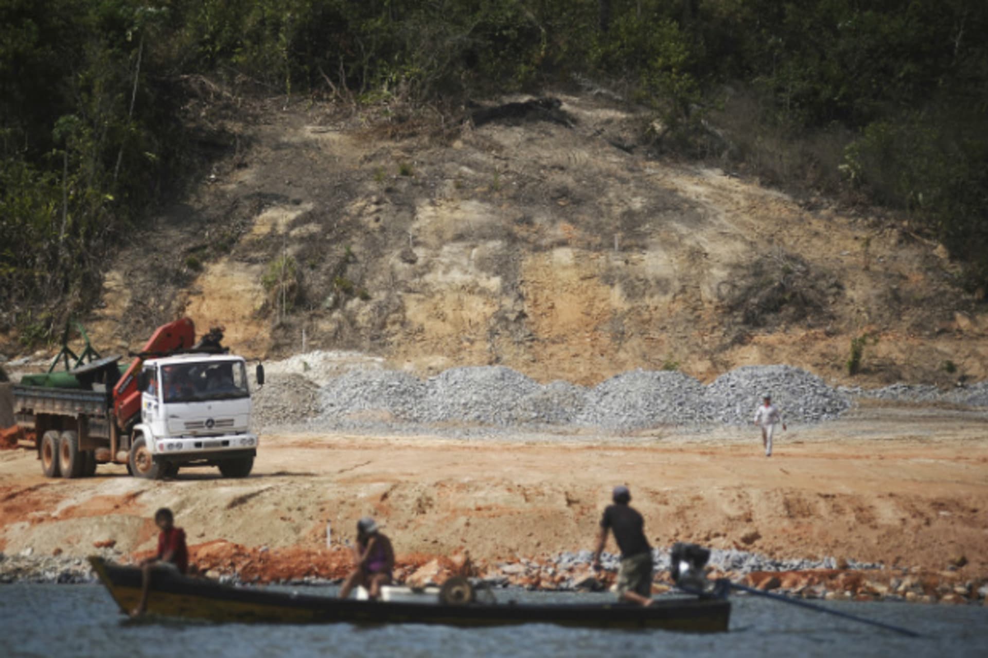 <p>Fishermen approach the Belo Monte hydroelectric dam construction site, during a protest against its construction and its impac… their livelihoods, along the Xingu River near Altamira in Para State on September 25, 2012 (Lunae Parracho/Courtesy Reuters).</p>

