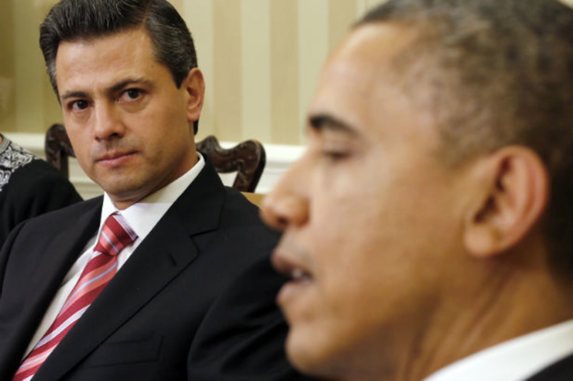 <p>Mexico’s President-elect Enrique Pena Nieto listens to U.S. President Barack Obama (R) in the Oval Office of the White House in Washington November 27, 2012 (Kevin Lamarque/Courtesy Reuters).</p>
