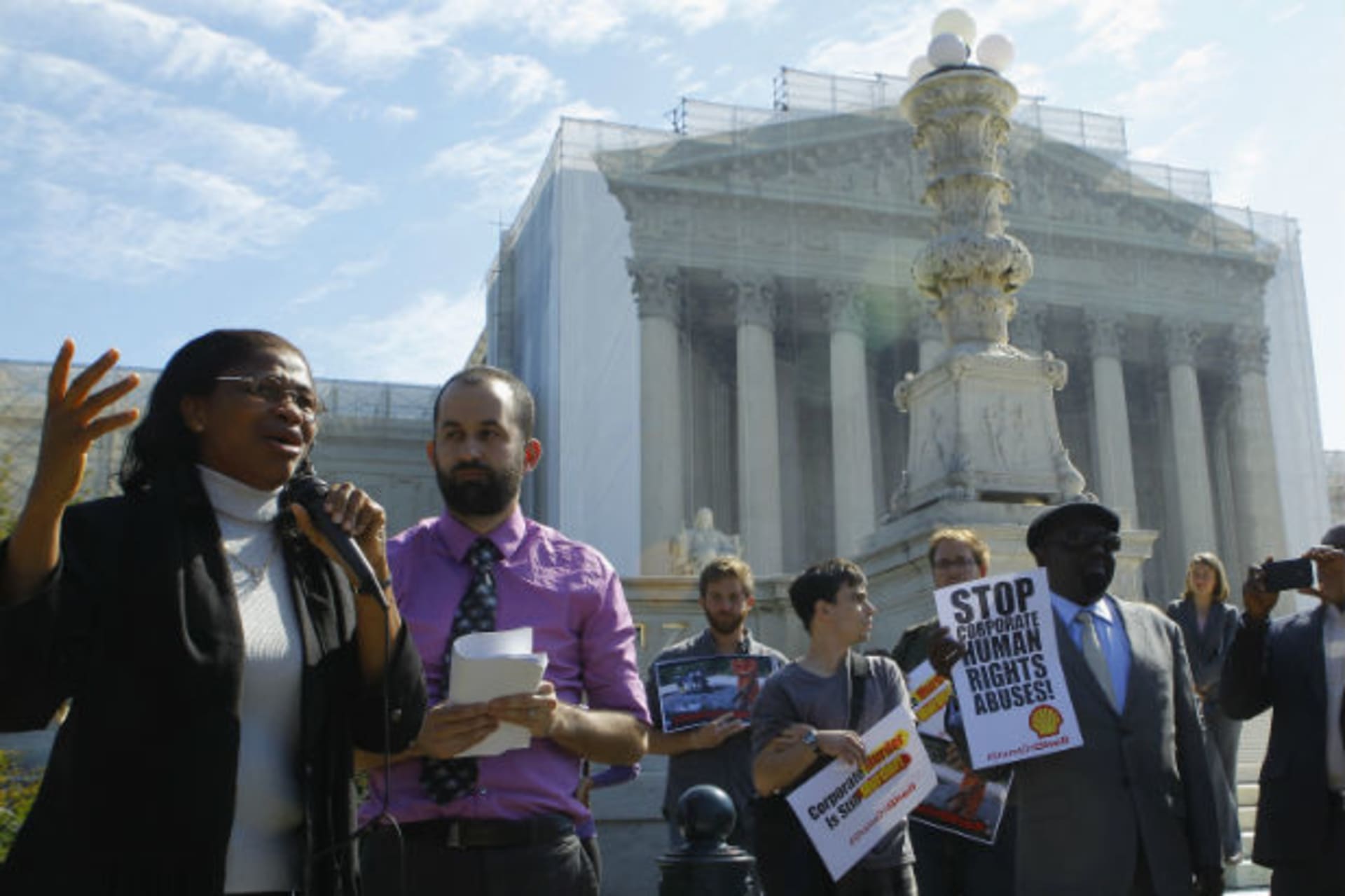 <p>Plaintiff Esther Kiobel (L) joins a protest against Royal Dutch Shell Petroleum in front of the U.S. Supreme Court in Washington on October 1, 2012 (Gary Cameron/Courtesy Reuters).</p>
