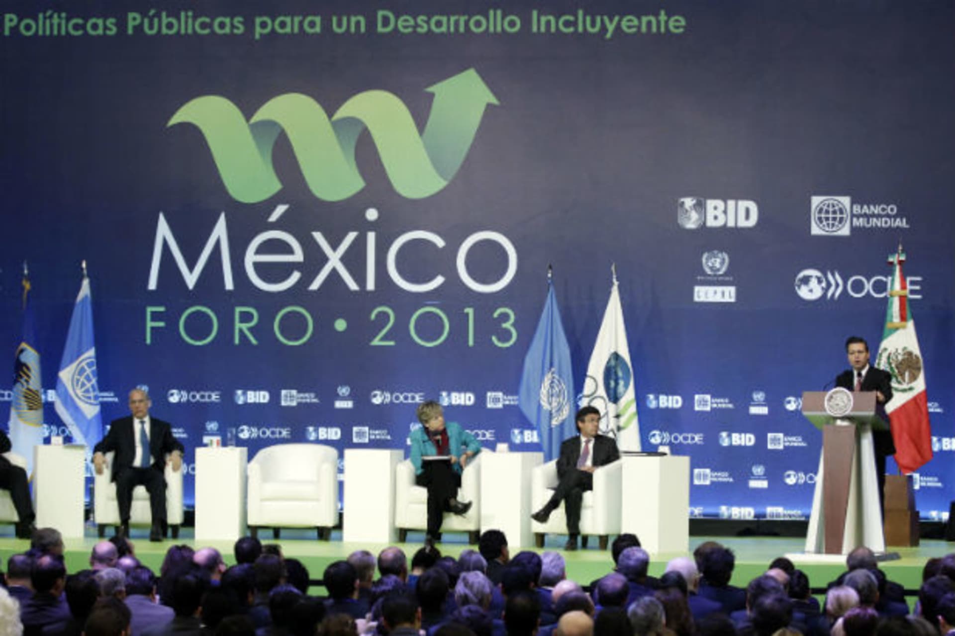 <p>Mexico’s President Enrique Pena Nieto (R) delivers a speech at the inauguration ceremony of the Forum Mexico 2013: Public Policies for Inclusive Development, at Centro Banamex in Mexico City on January 9, 2013 (Henry Romero/Courtesy Reuters).</p>
