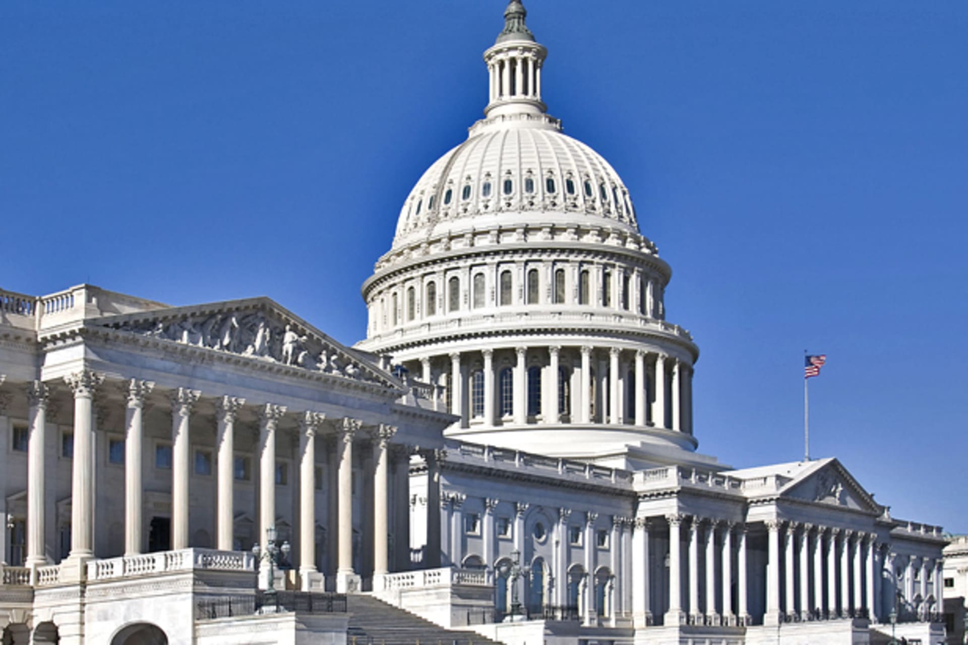 <p>A view of the House of Representatives Building and the East Portico of the U.S. Capitol (Ron Cogswell/Courtesy Flickr).</p>