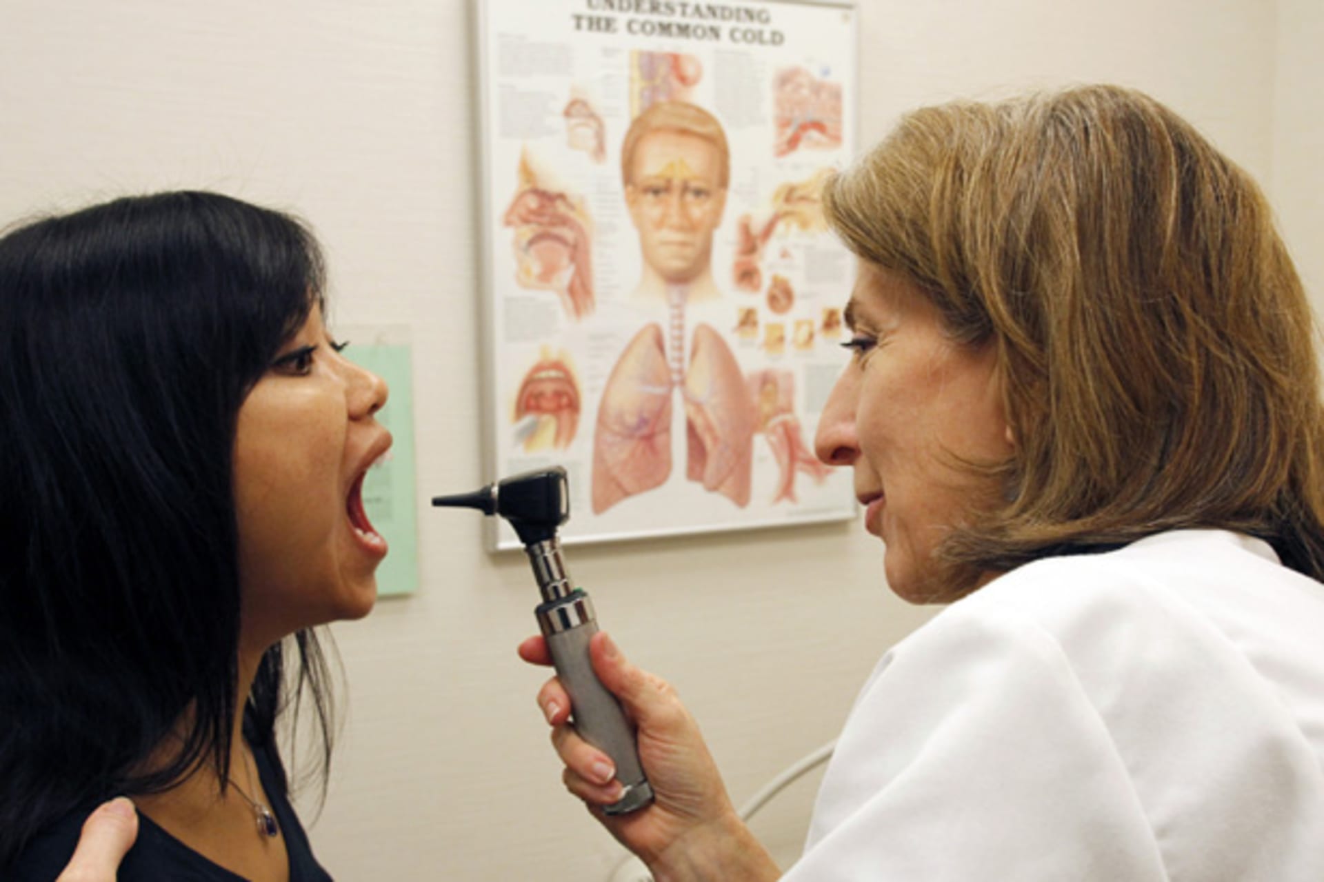 <p>Dr. Liz Sequeira examines a patient at the Discovery Wellness Center in Silver Spring, Maryland (Jim Bourg/Courtesy Reuters).</p>

