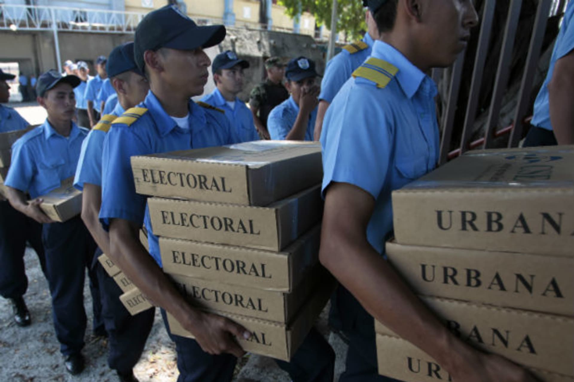 <p>Nicaraguan police carry ballot boxes, which will be used for the upcoming presidential election, in Managua</p>
