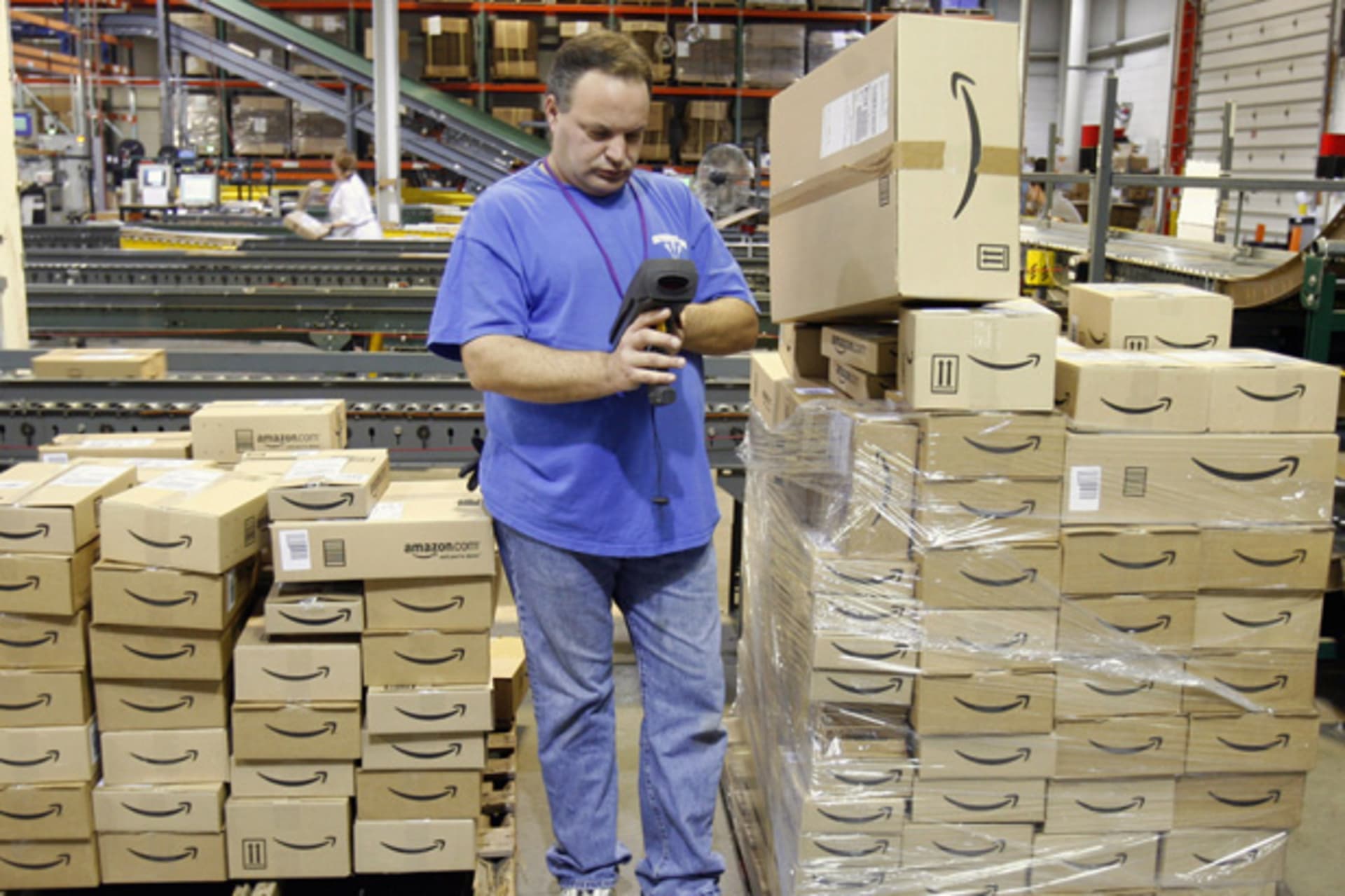 <p>A worker checks a shipment of outgoing boxes at the Amazon.com warehouse facility in New Castle, Delaware (Tim Shaffer/Courtesy Reuters). In 2011, Amazon received $7.5 million in subsidies from the State of Delaware.</p>
