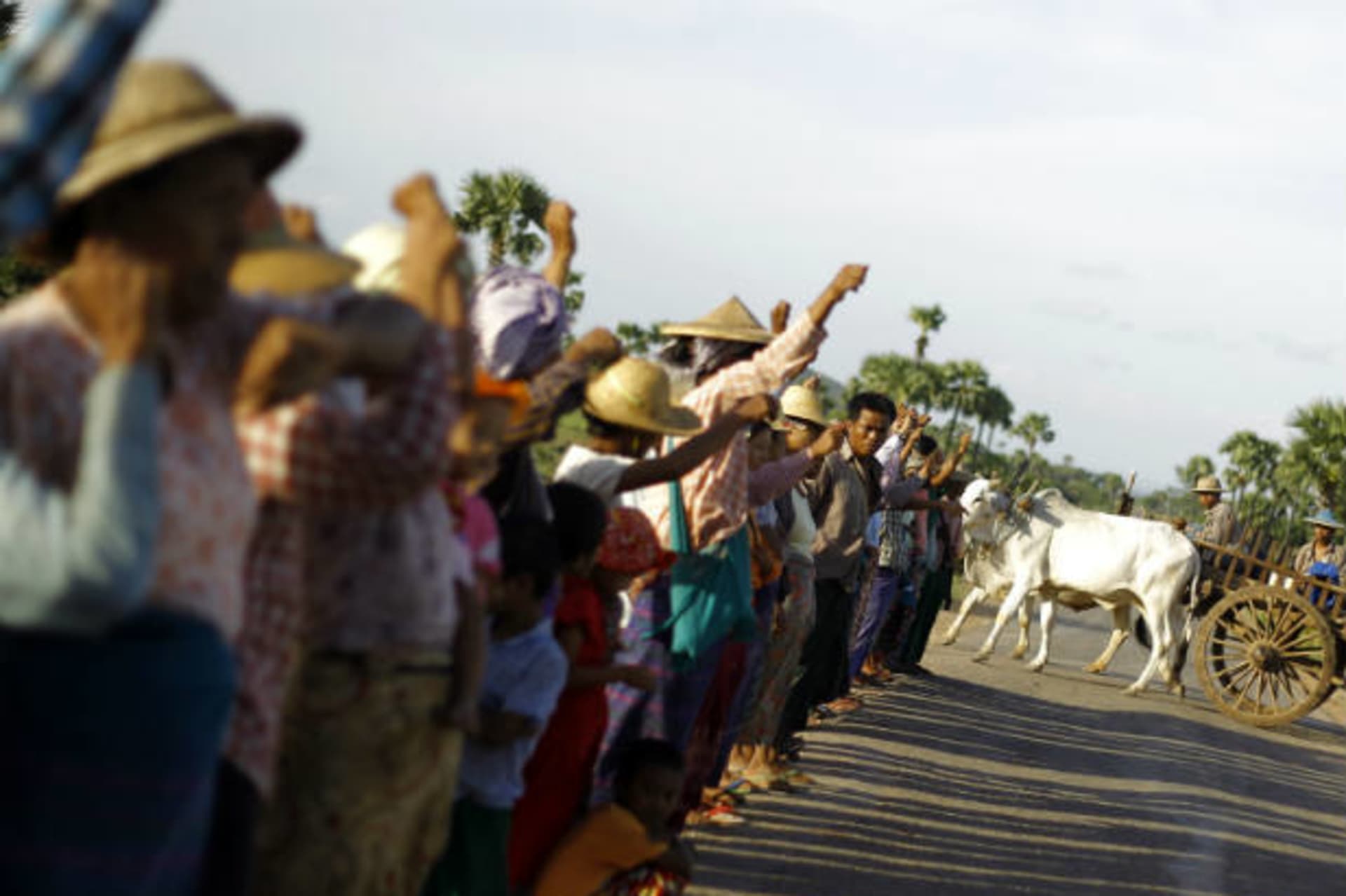 <p>Villagers shout for their farms and villages during protests against the Lebadaung copper mine project in Sarlingyi township in Myanmar on September 12, 2012 (Soe Zeya Tun/Courtesy Reuters).</p>