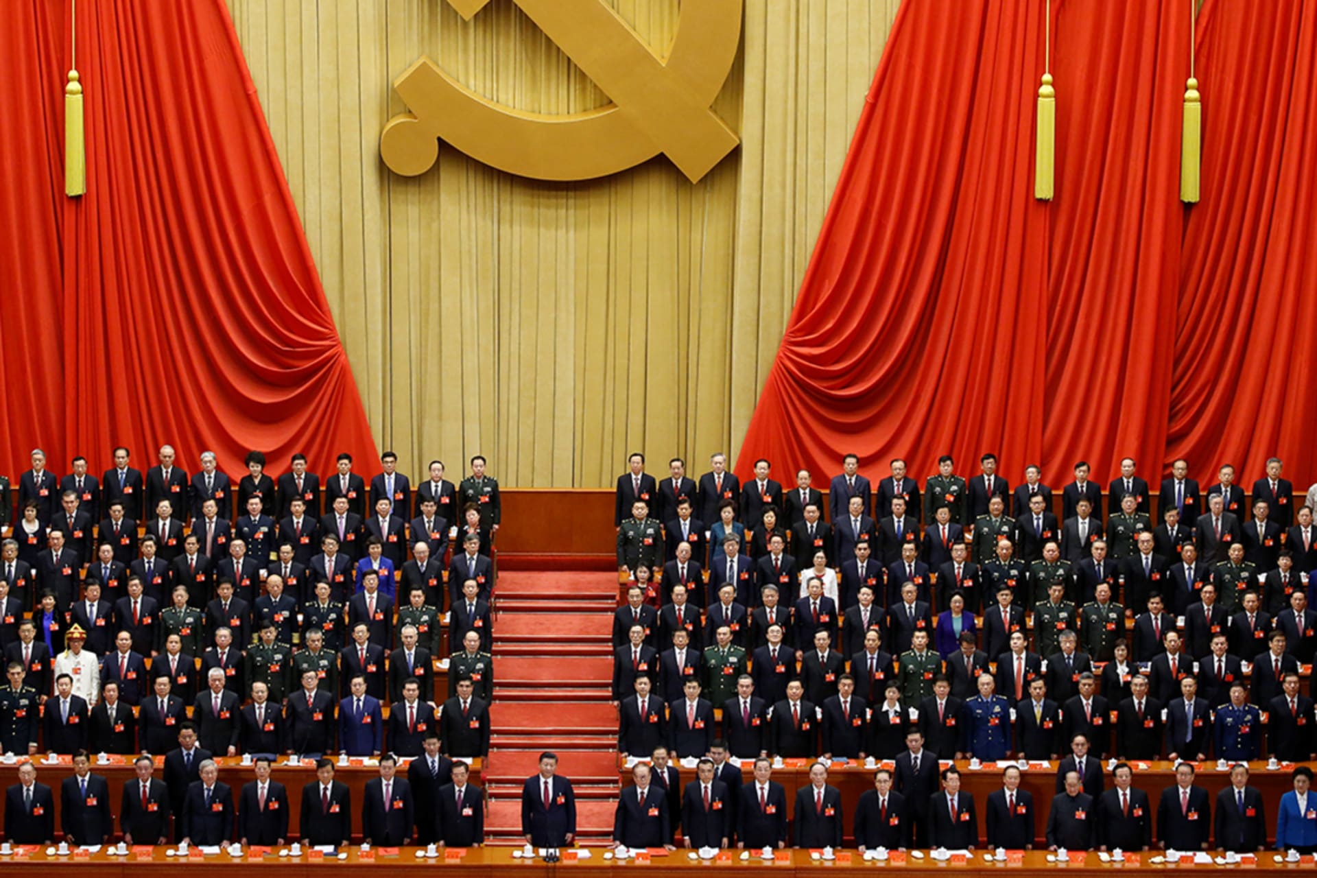 <p>Xi Jinping stands before delegates during the nineteenth National Congress in 2017.</p>
