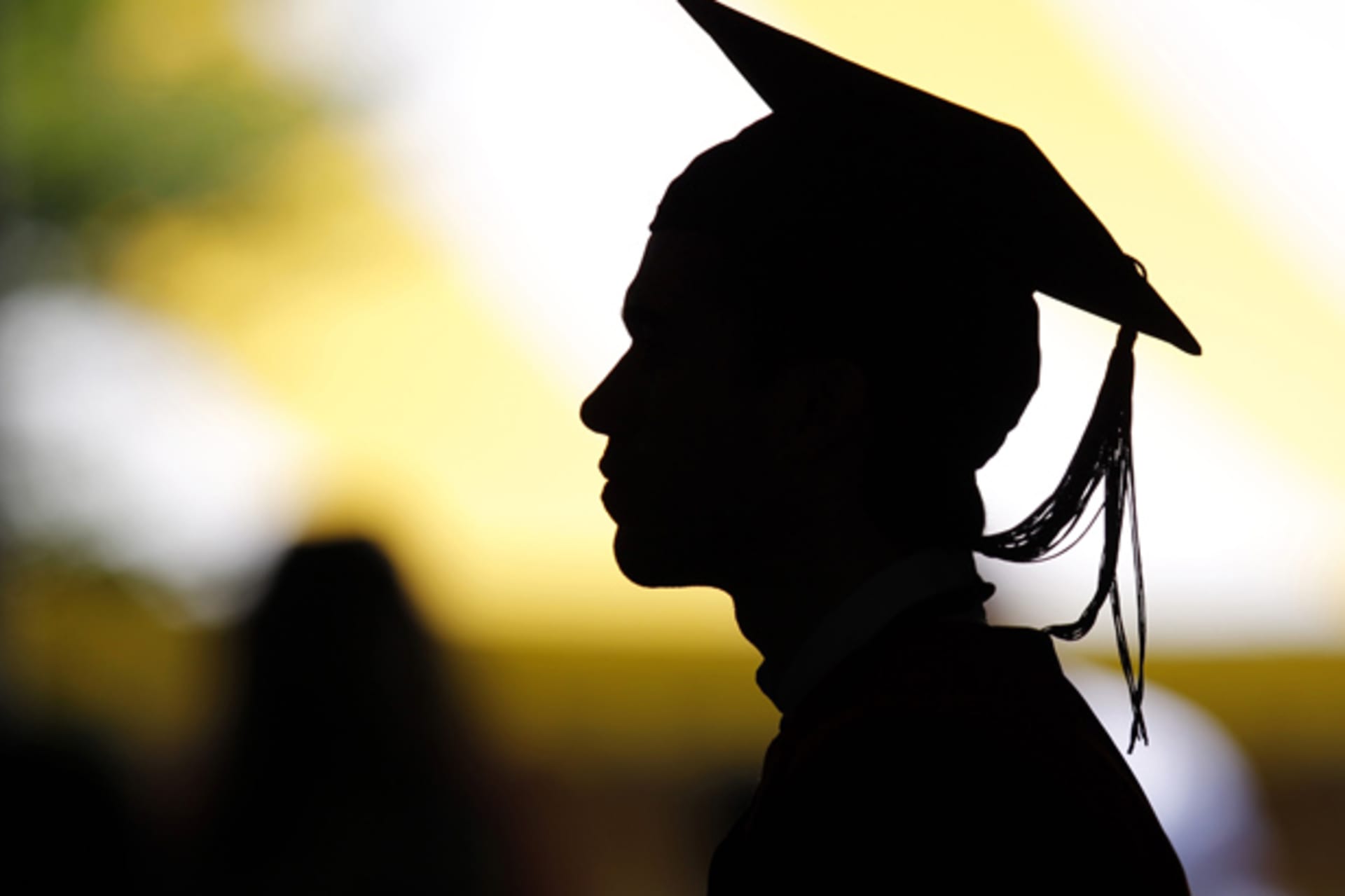 <p>College students take their seats at a diploma ceremony (Brian Snyder/Reuters).</p>
