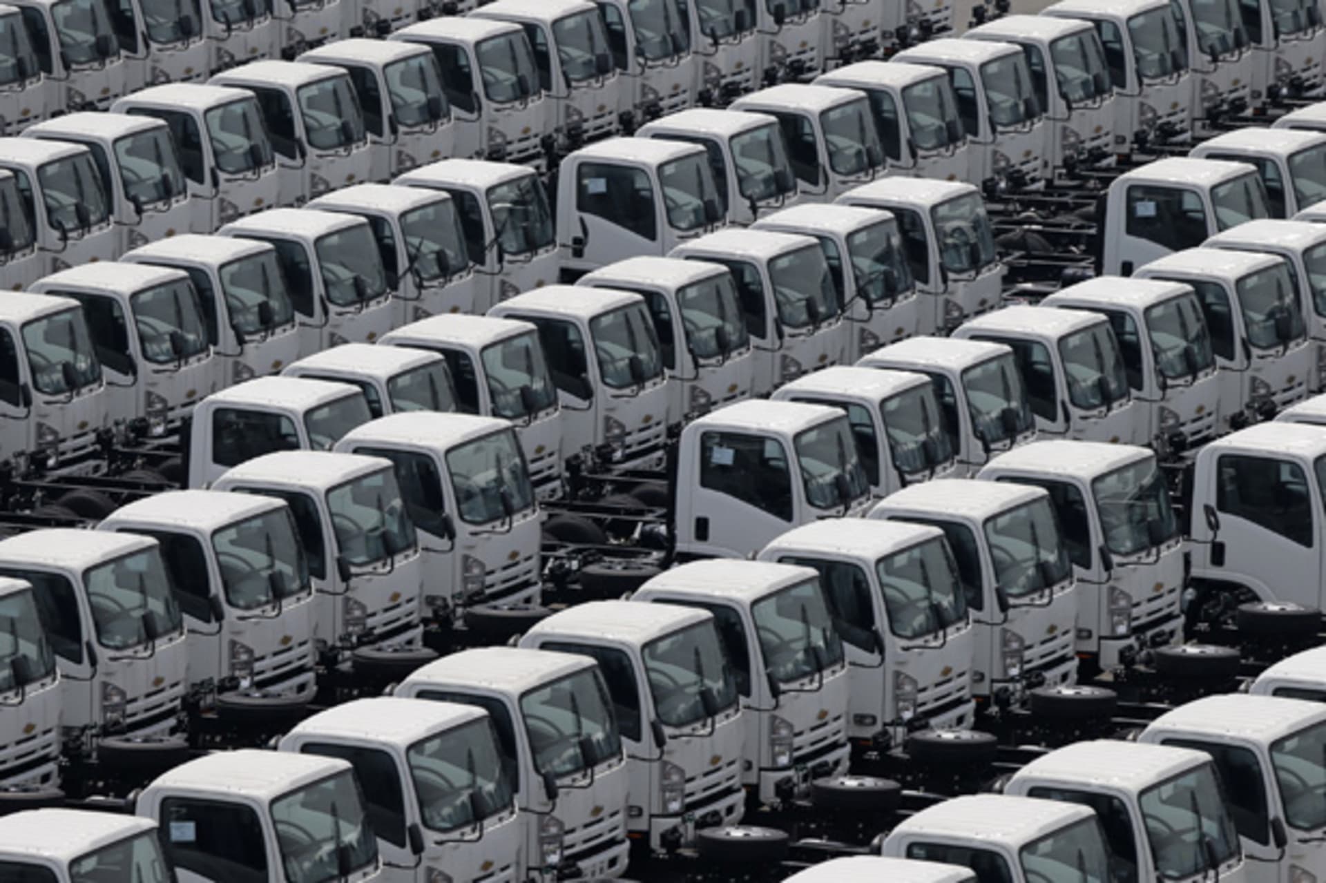 <p>Newly produced trucks are seen at an industrial port before they are loaded onto a cargo ship in Yokohama, Japan (Kim Kyung-Hoon/Courtesy Reuters).</p>
