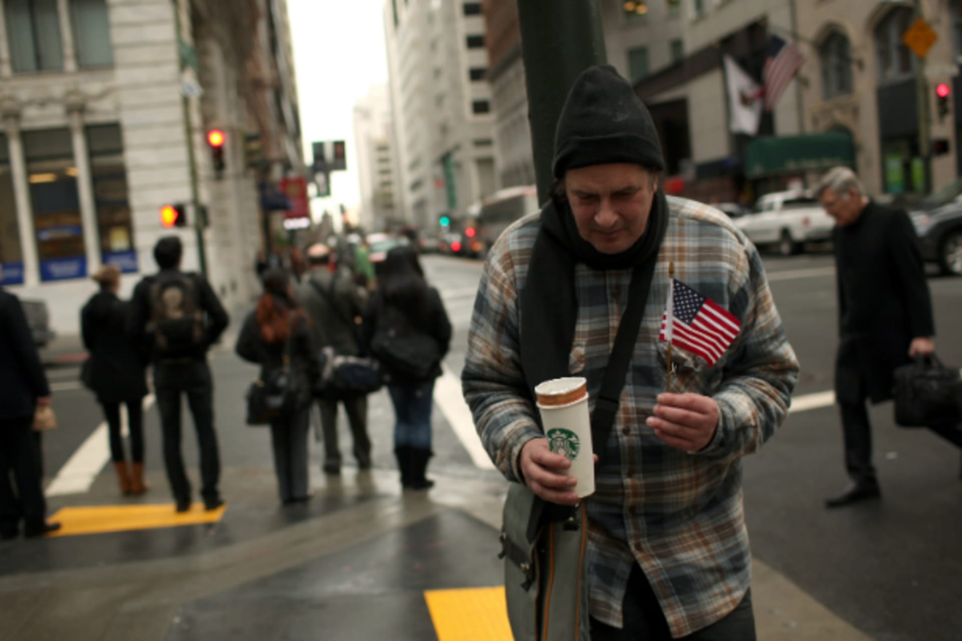 <p>A homeless man begs for money in the Financial District in San Francisco, California (Robert Galbraith/Courtesy Reuters).</p>
