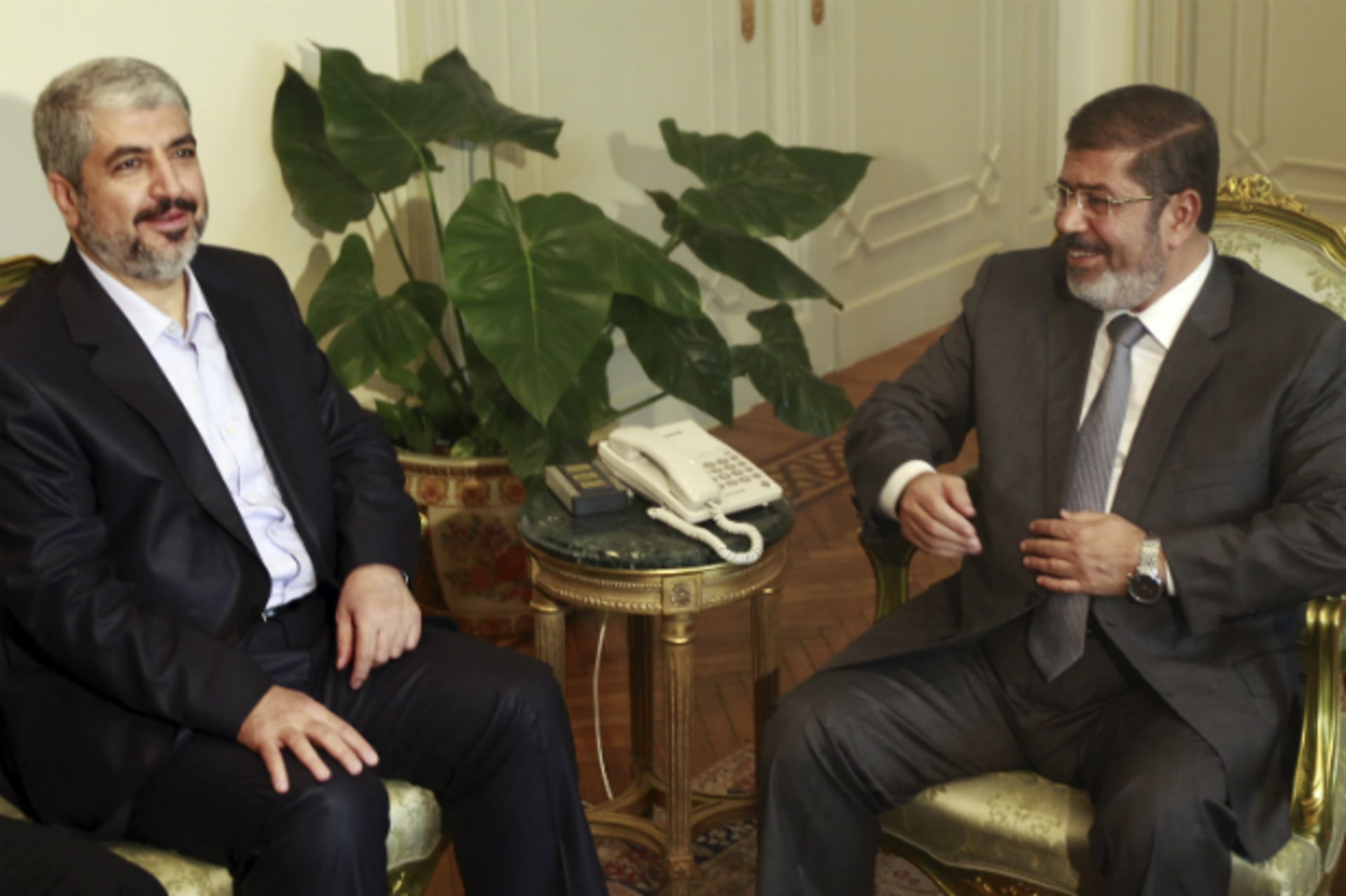 <p>Egypt’s President Mohamed Mursi (R) meets with Hamas leader Khaled Meshaal at the presidential palace in Cairo, July 19, 2012. (Courtesy REUTERS/Amr Abdallah Dalsh)</p>
