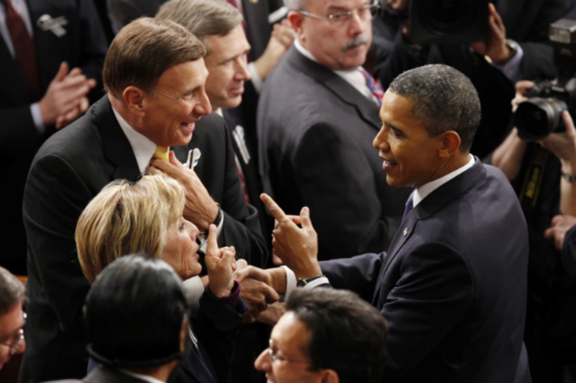 <p>Pres. Obama speaks with Sen. Barbara Boxer (D-CA) and Rep. John Mica (R-FL), the chairmen of the transportation bill’s joint-chamber committee, before the 2011 State of the Union address (Jason Reed/Courtesy Reuters).</p>
